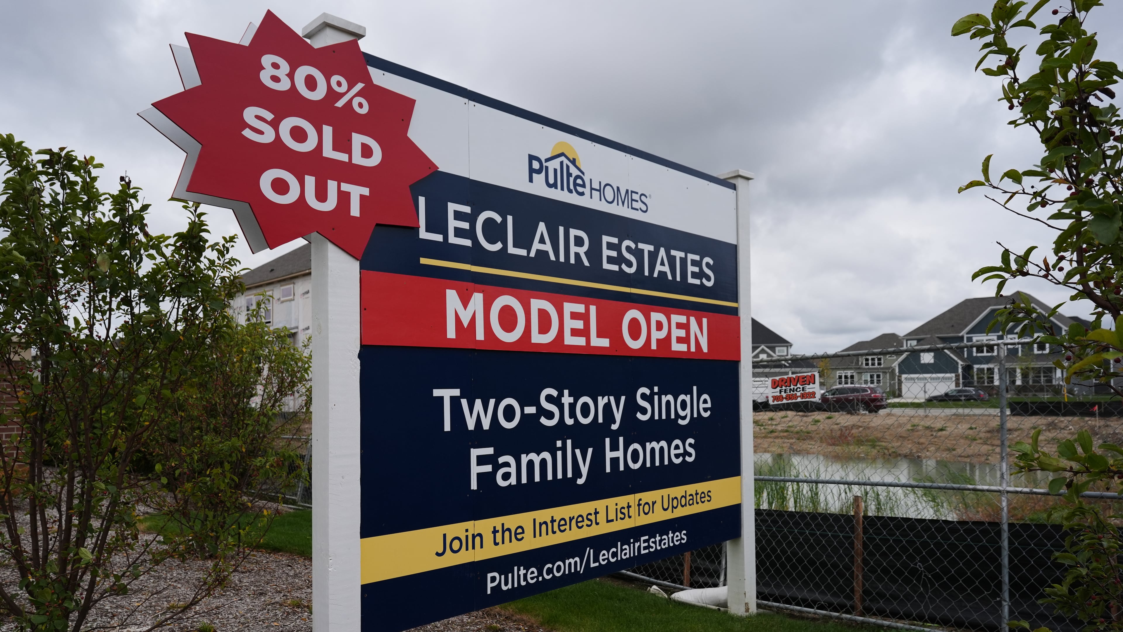 A sign stands in front of a new home construction site in Deerfield, Ill., Wednesday, Oct. 14, 2026. (AP Photo/Nam Y. Huh)