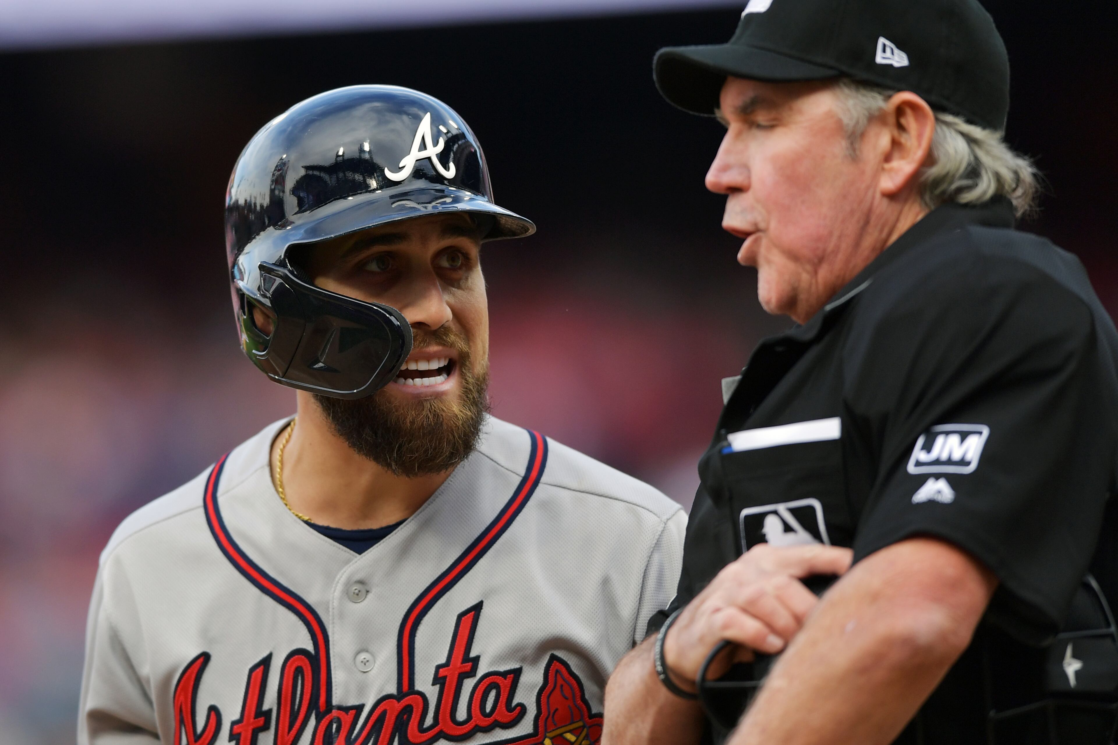 PHILADELPHIA, PA - MARCH 28: Ender Inciarte #11 of the Atlanta Braves talks to home plate umpire Mike Winters #33 after getting called out on strikes in the fifth inning against the Philadelphia Phillies on Opening Day at Citizens Bank Park on March 28, 2019 in Philadelphia, Pennsylvania. (Photo by Drew Hallowell/Getty Images)