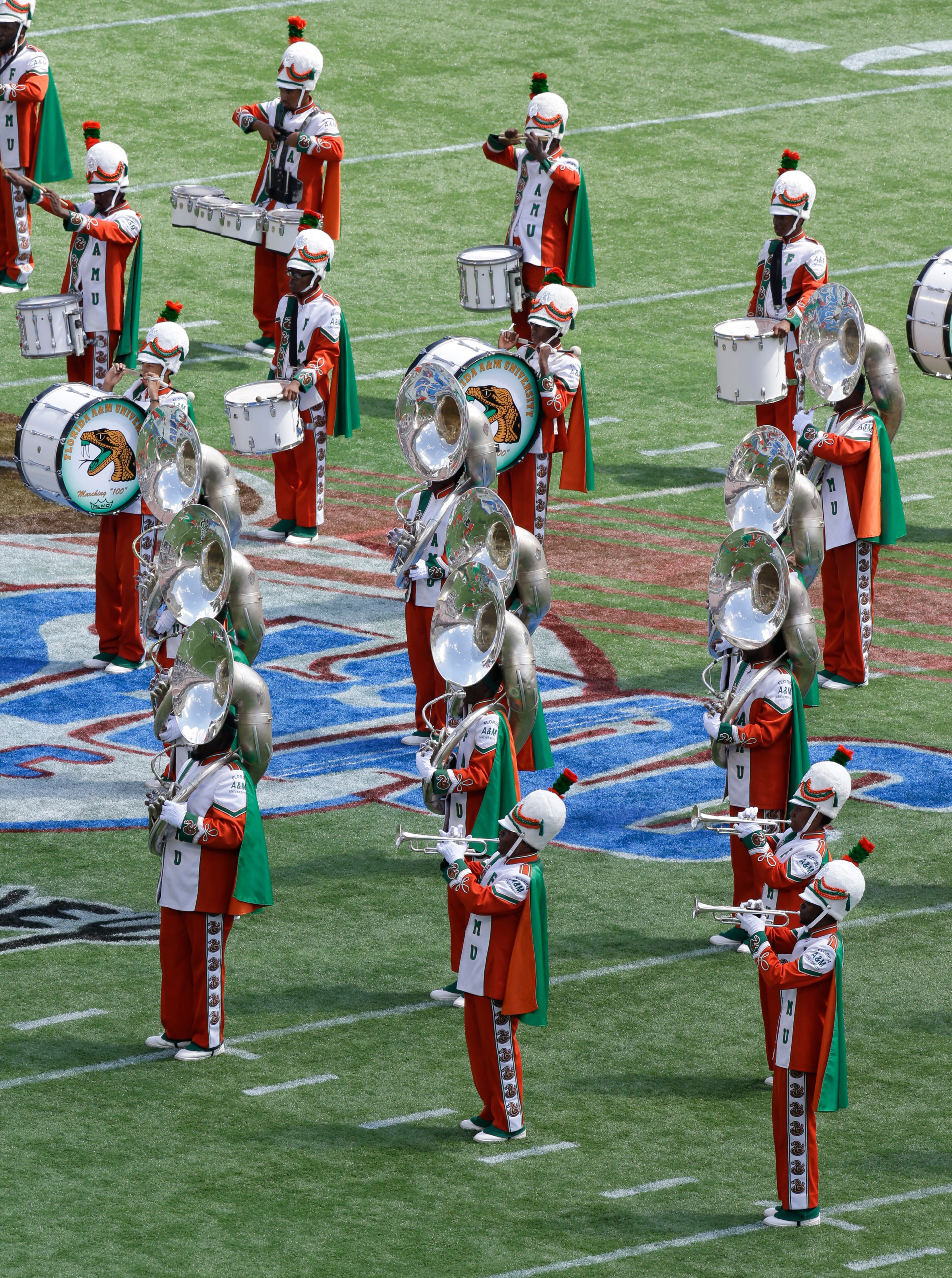 The Florida A&M University band performs Sunday, Sept. 1, 2013, in Orlando, Fla., during FAMU's season-opening football game against Mississippi Valley State. It's the band's first appearance in a football stadium in nearly 22 months after the 2011 hazing death of a drum major. (AP Photo/John Raoux)