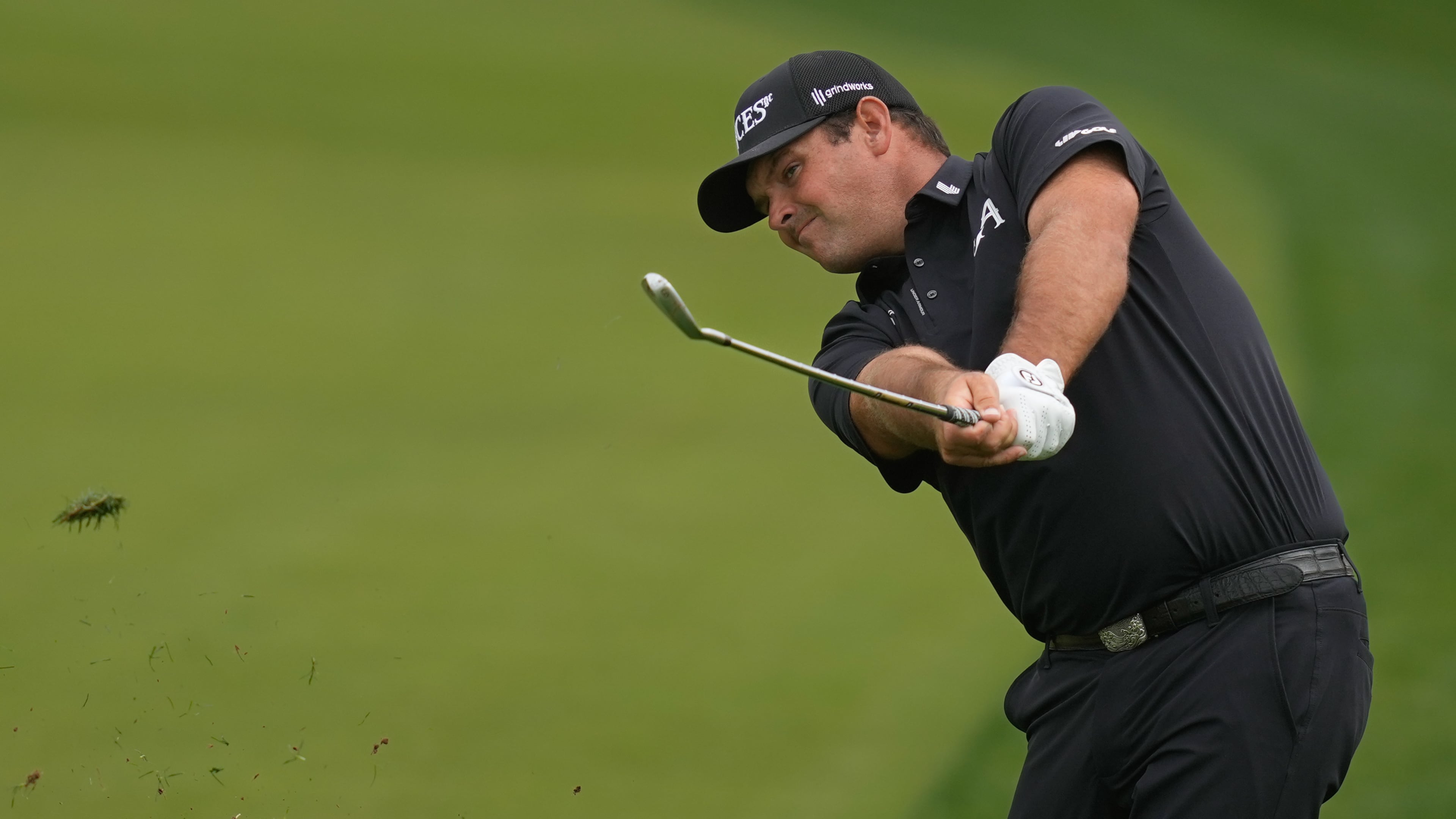 Patrick Reed of the United States plays his second shot on the 8th hole during the final round of the Dubai Desert Classic in United Arab Emirates, Sunday, Jan. 25, 2026. (AP Photo/Altaf Qadri)
