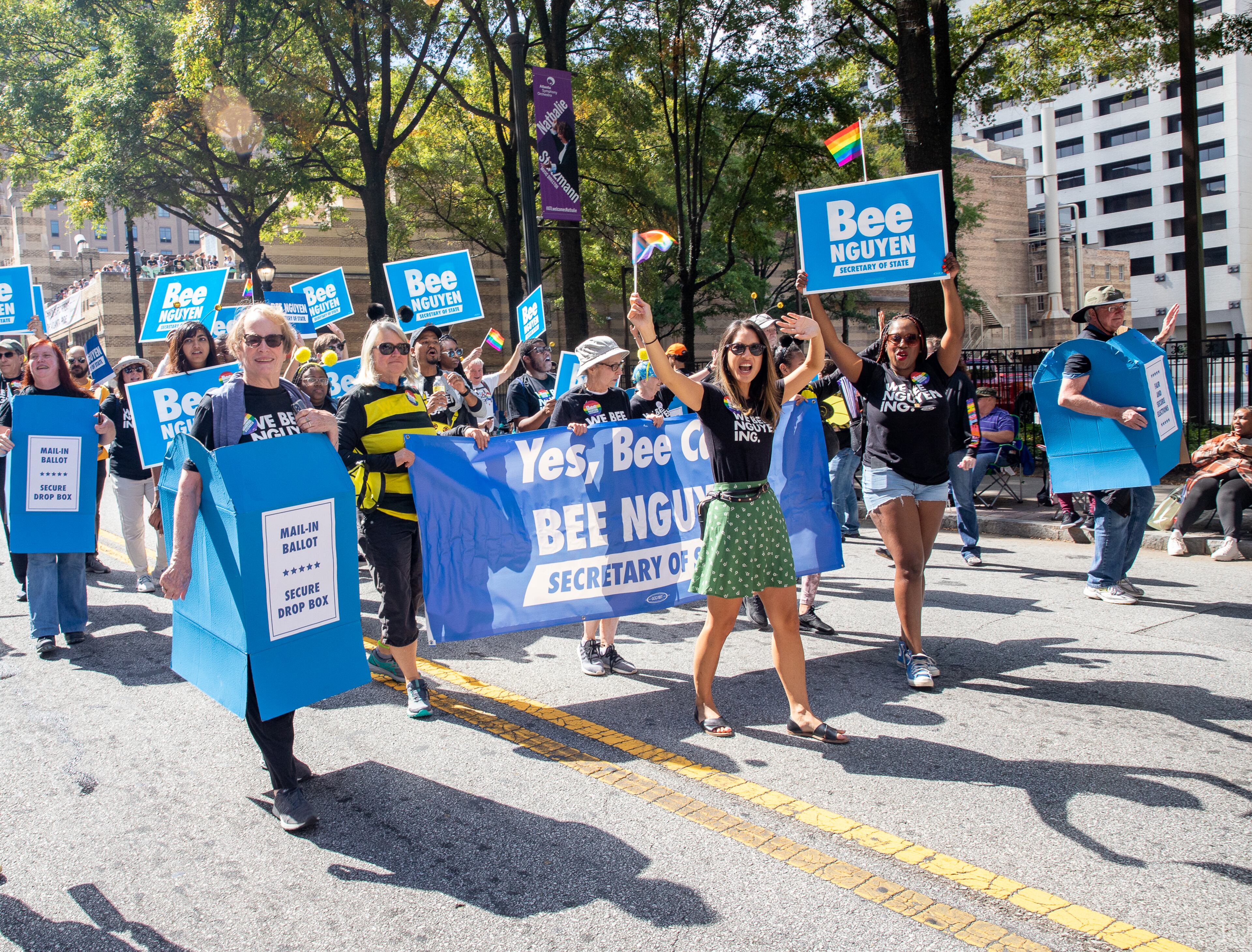 Bee Nguyen is on the campaign trail at the Pride Parade on Peachtree Street on Sunday, Oct.9, 2022. (Jenni Girtman for The Atlanta Journal-Constitution)