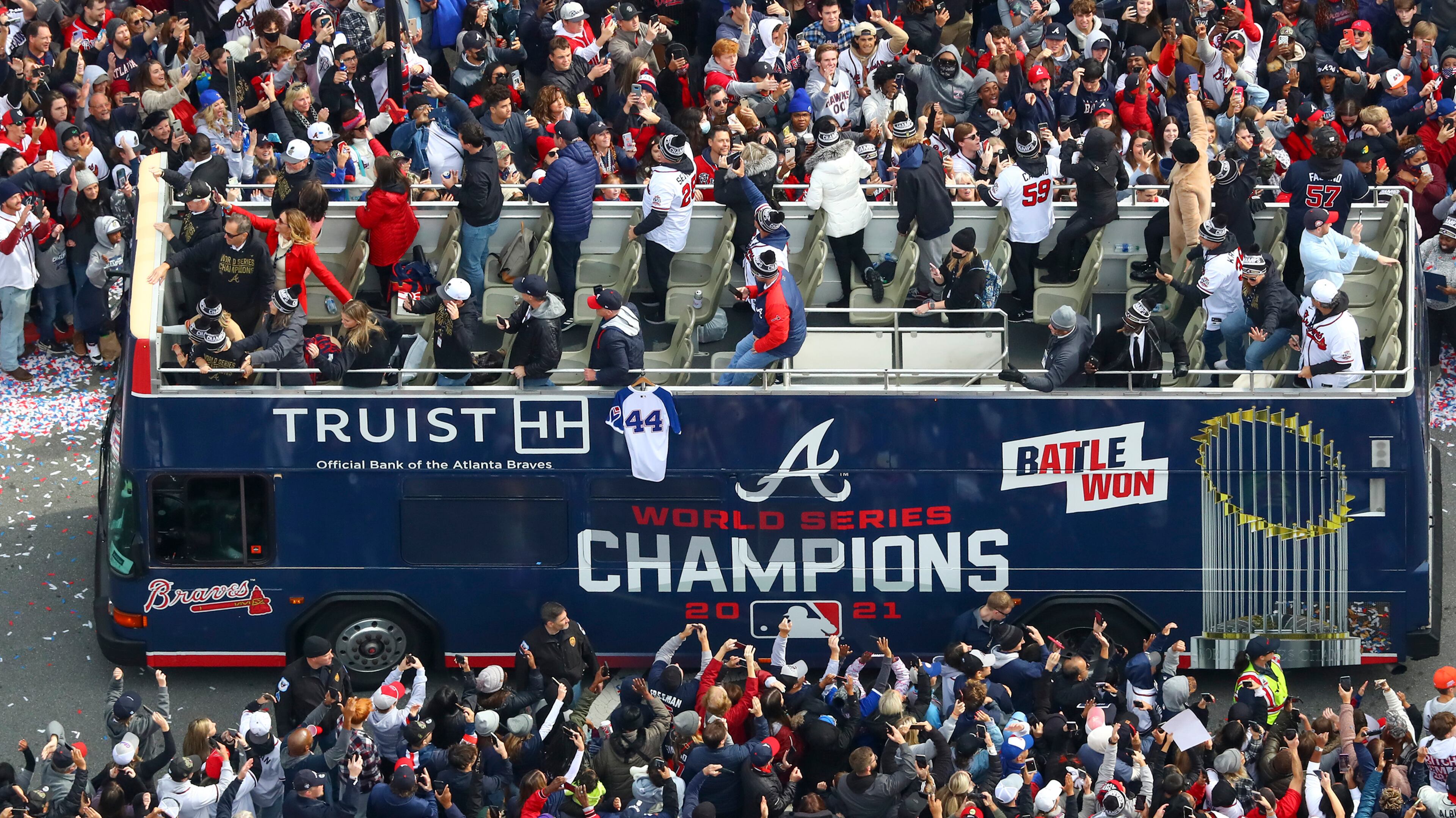 Fans cheer the World Series champion Atlanta Braves on Nov. 5 as they parade to Truist Park. (Curtis Compton/Atlanta Journal-Constitution/TNS)