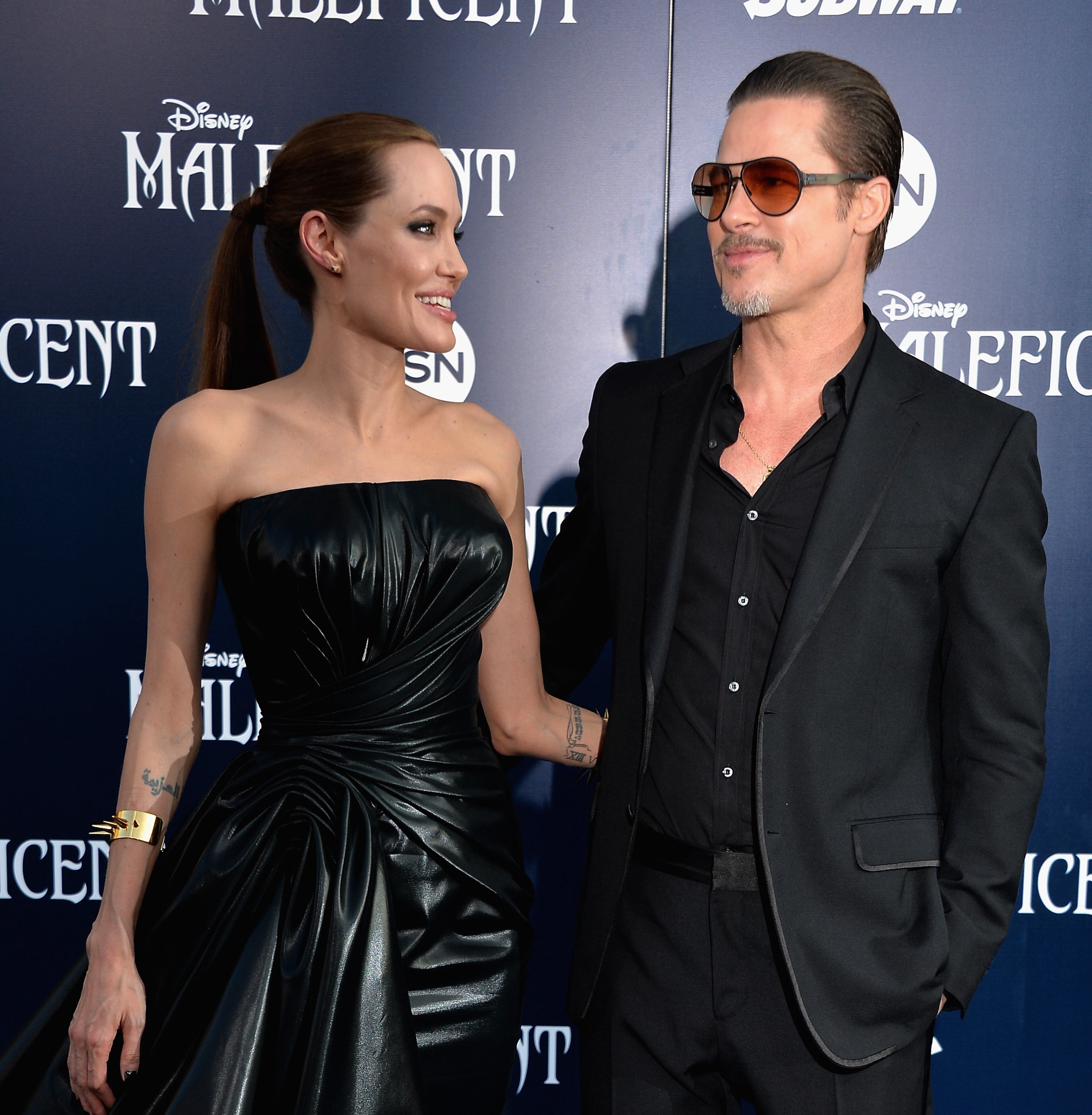 HOLLYWOOD, CA - MAY 28: Actress Angelina Jolieand Brad Pitt arrive at the World Premiere Of Disney's "Maleficent" at the El Capitan Theatre on May 28, 2014 in Hollywood, California. (Photo by Frazer Harrison/Getty Images)