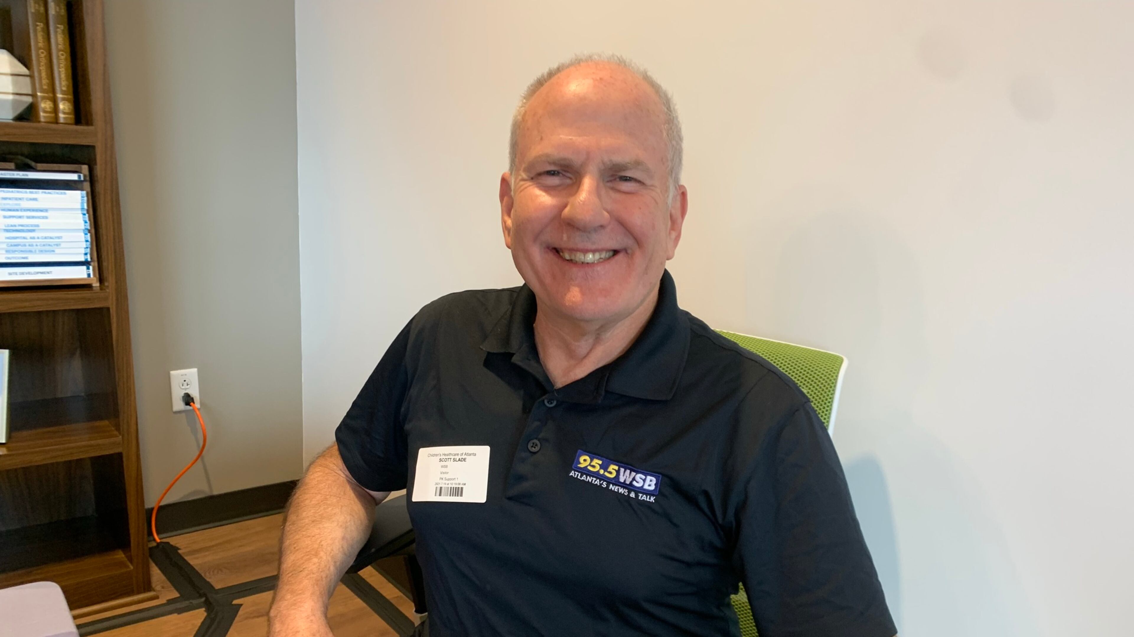 Scott Slade, the morning host for WSB, helped come up with the entire Care-a-thon idea and was there to announce the final total July 30, 2021. RODNEY HO/rho@ajc.com