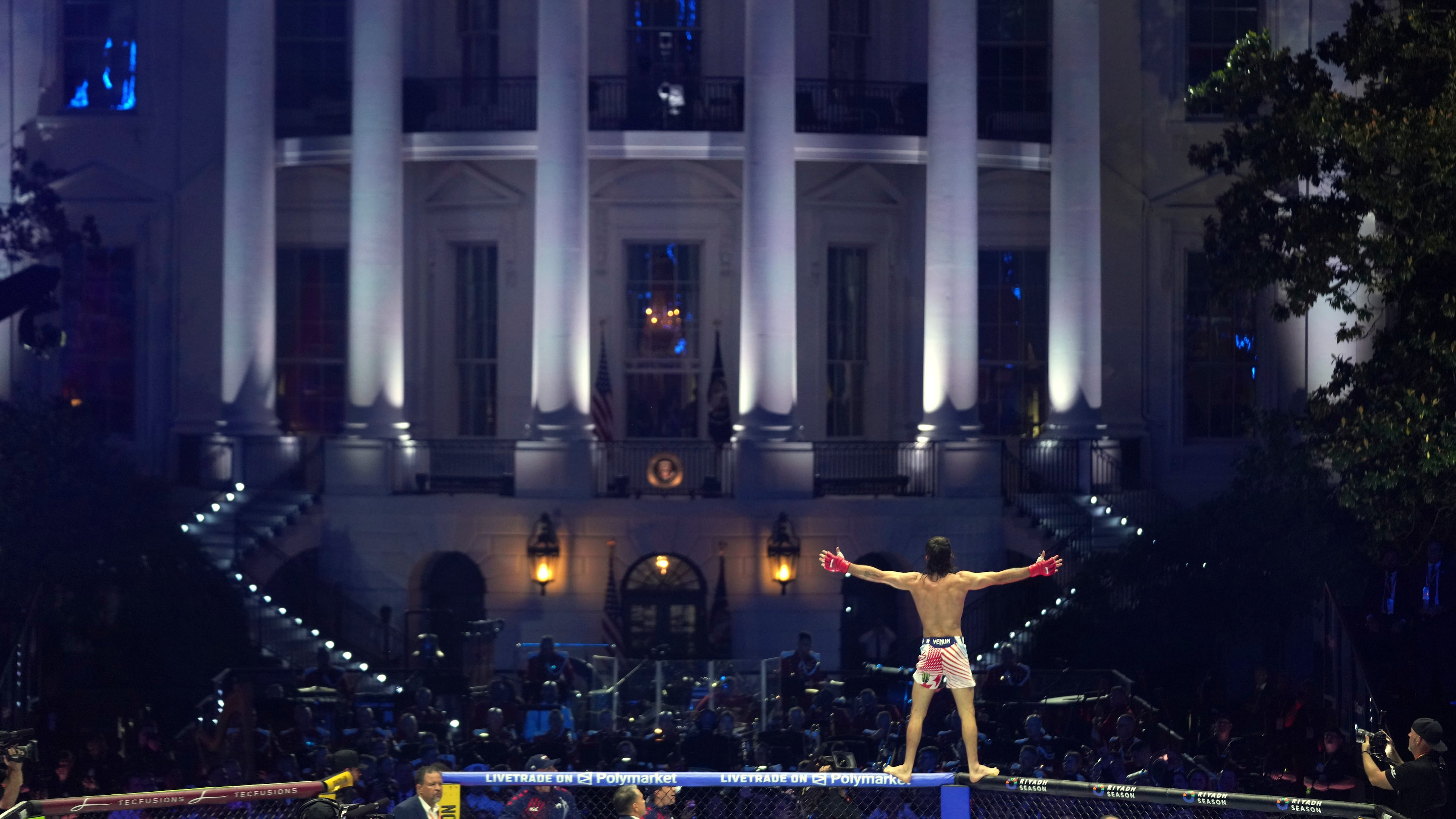 Diego Lopes celebrates during a featherweight bout against Steve Garcia during UFC Freedom 250 on the South Lawn of the White House, Sunday, June 14, 2026, in Washington. (AP Photo/Mark Schiefelbein)