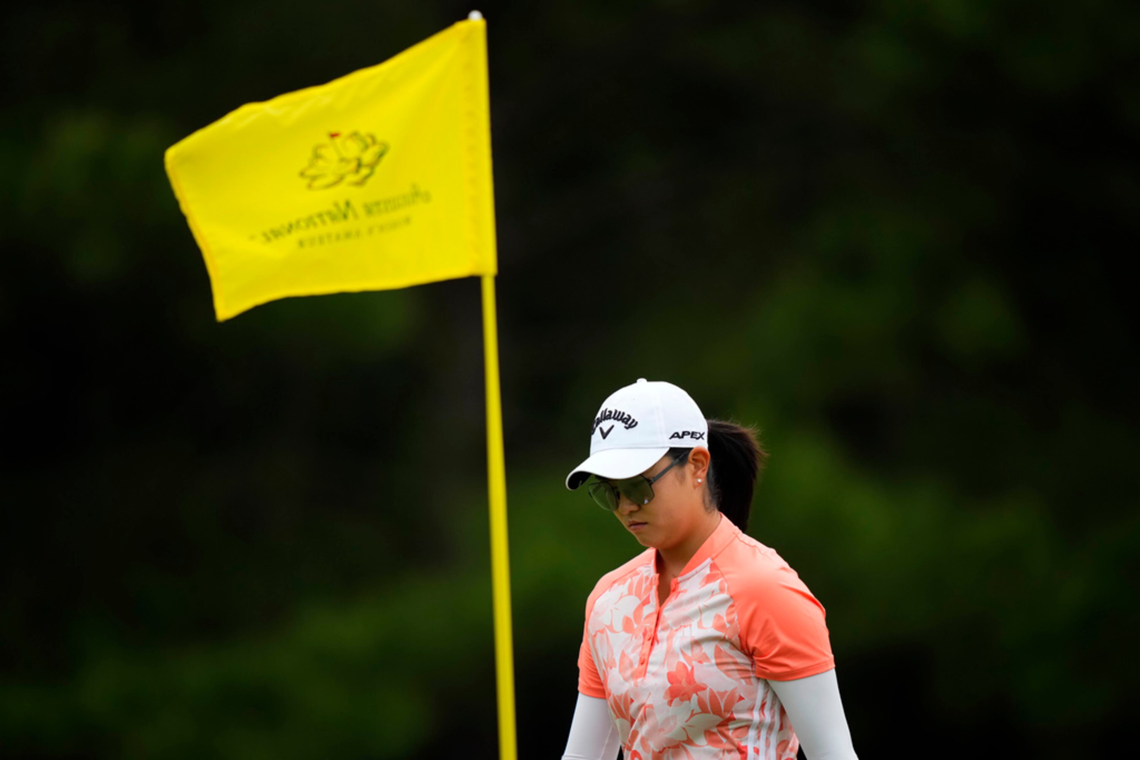 Rose Zhang walks on the first green during the final round of the Augusta National Women's Amateur golf tournament, Saturday, April 1, 2023, in Augusta, Ga. (AP Photo/Matt Slocum)