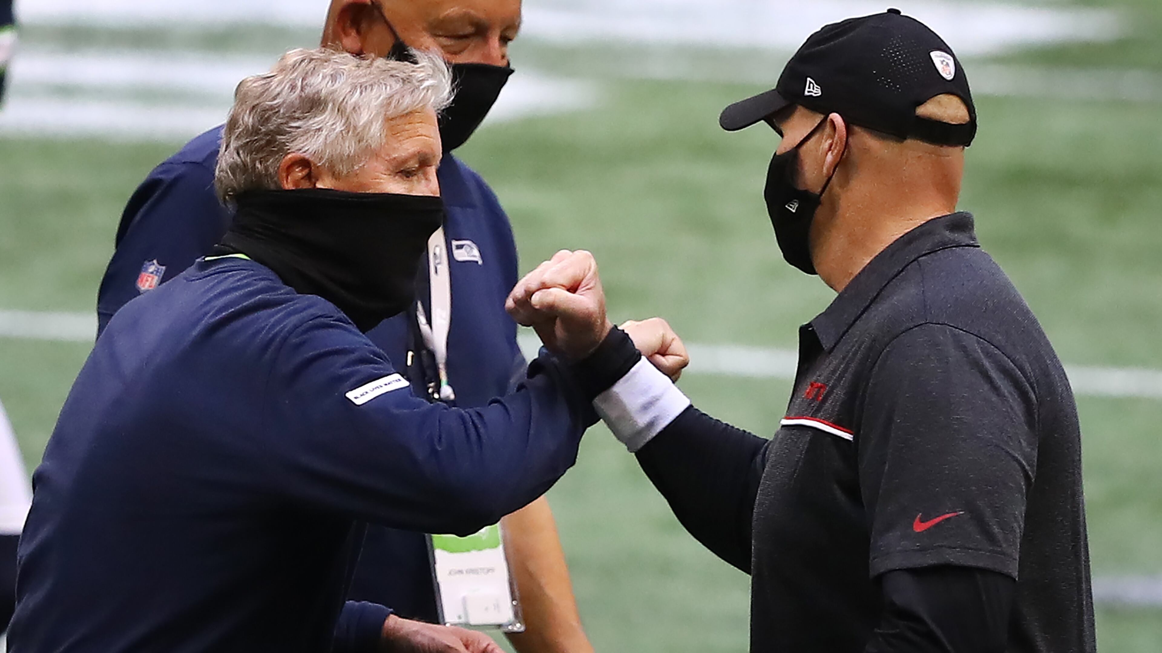 Falcons head coach Dan Quinn greets Seahawks head coach Pete Carroll after Seattle's 38-25 win in the season opener Sunday, Sept. 13, 2020, at Mercedes-Benz Stadium in Atlanta. (Curtis Compton / Curtis.Compton@ajc.com)
