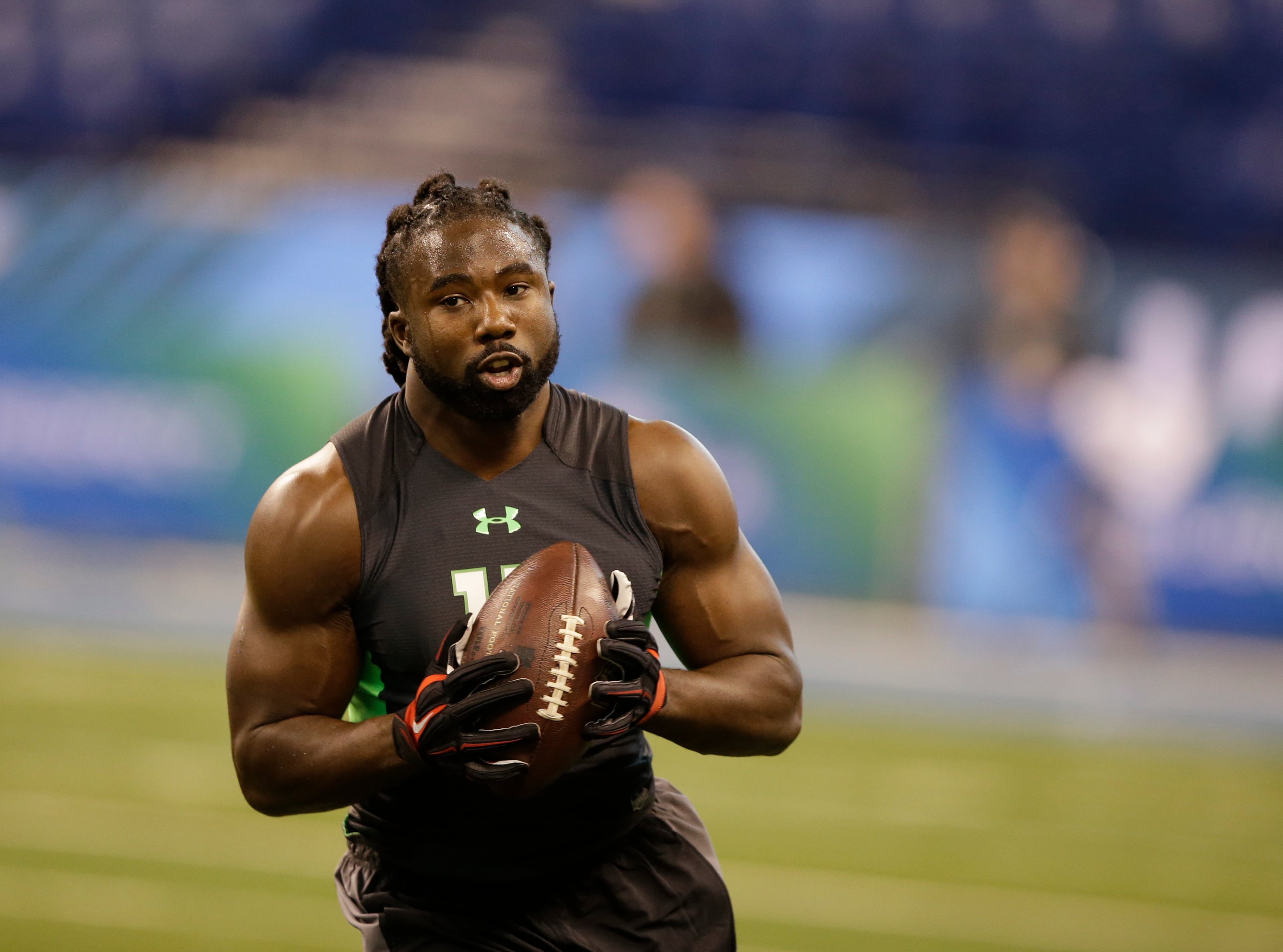 Georgia running back Keith Marshall runs a drill at the NFL football scouting combine in Saturday, Feb. 27, 2016, in Indianapolis. (AP Photo/Darron Cummings)