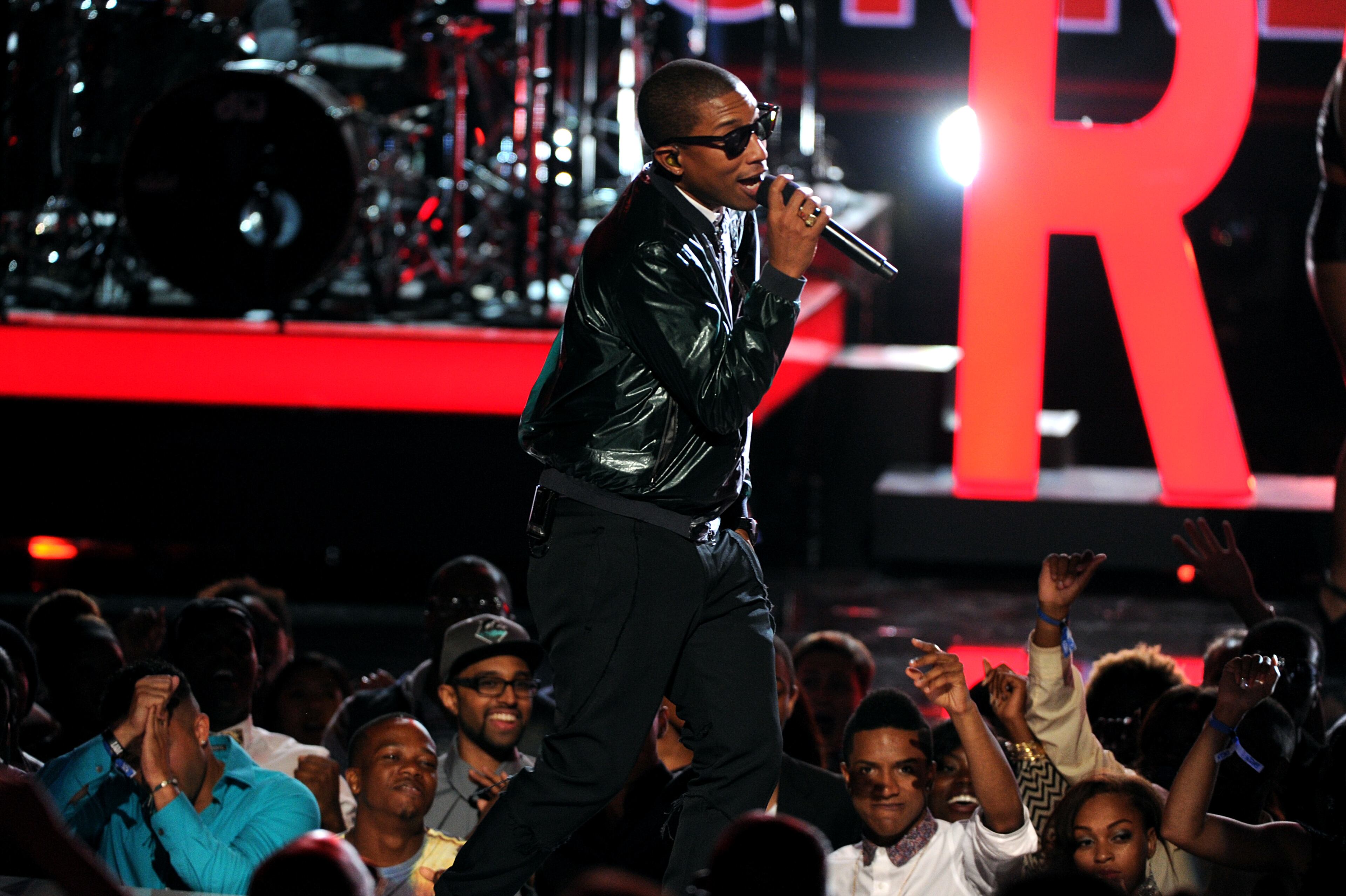 Pharrell Williams performs onstage at the BET Awards at the Nokia Theatre on Sunday, June 30, 2013, in Los Angeles. (Photo by Frank Micelotta/Invision/AP)