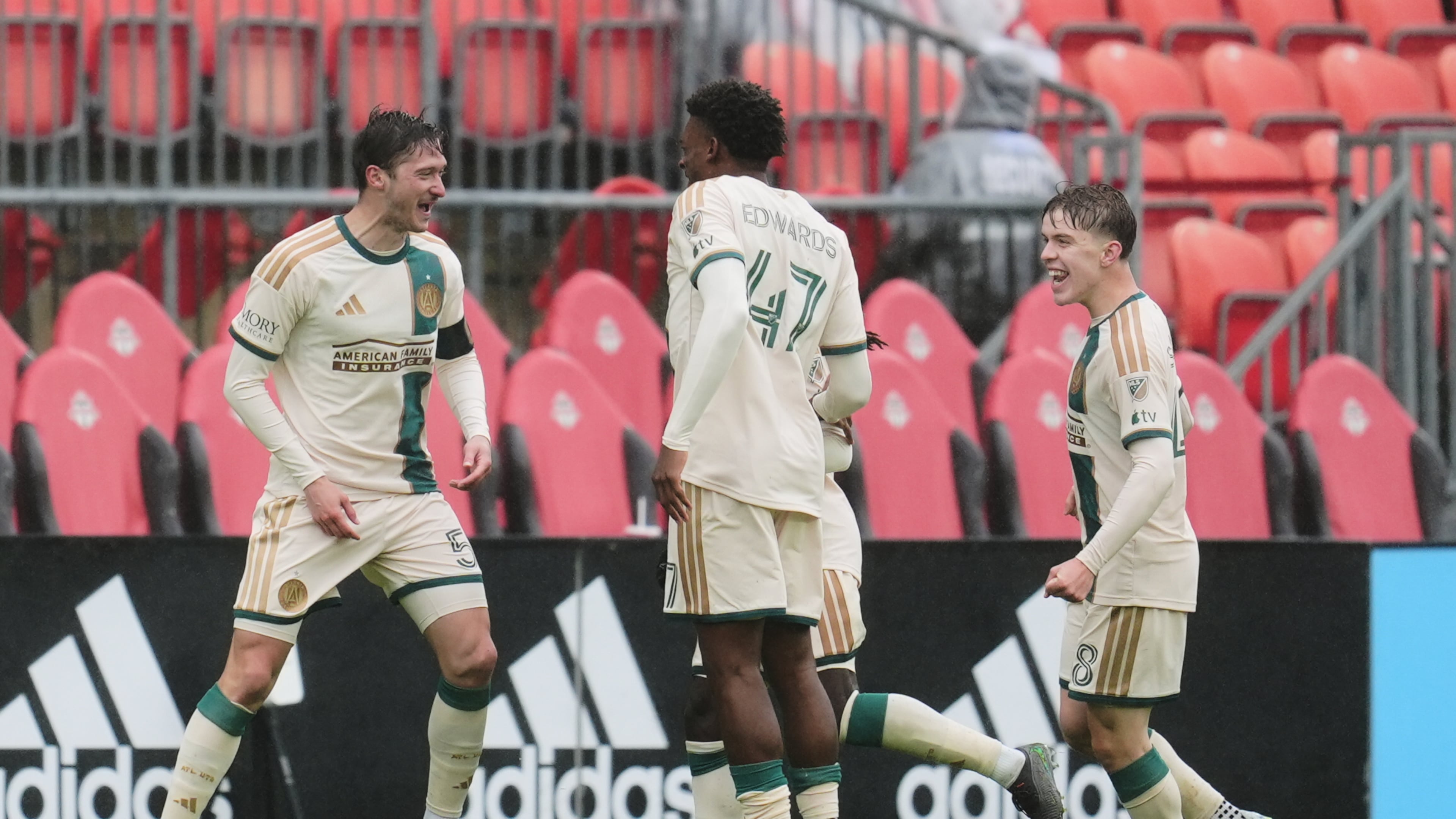 Atlanta United's Alexey Miranchuk (left) celebrates with teammates after scoring a goal against Toronto FC during the second half in Toronto on Saturday, April 25, 2026. (Frank Gunn/The Canadian Press via AP)