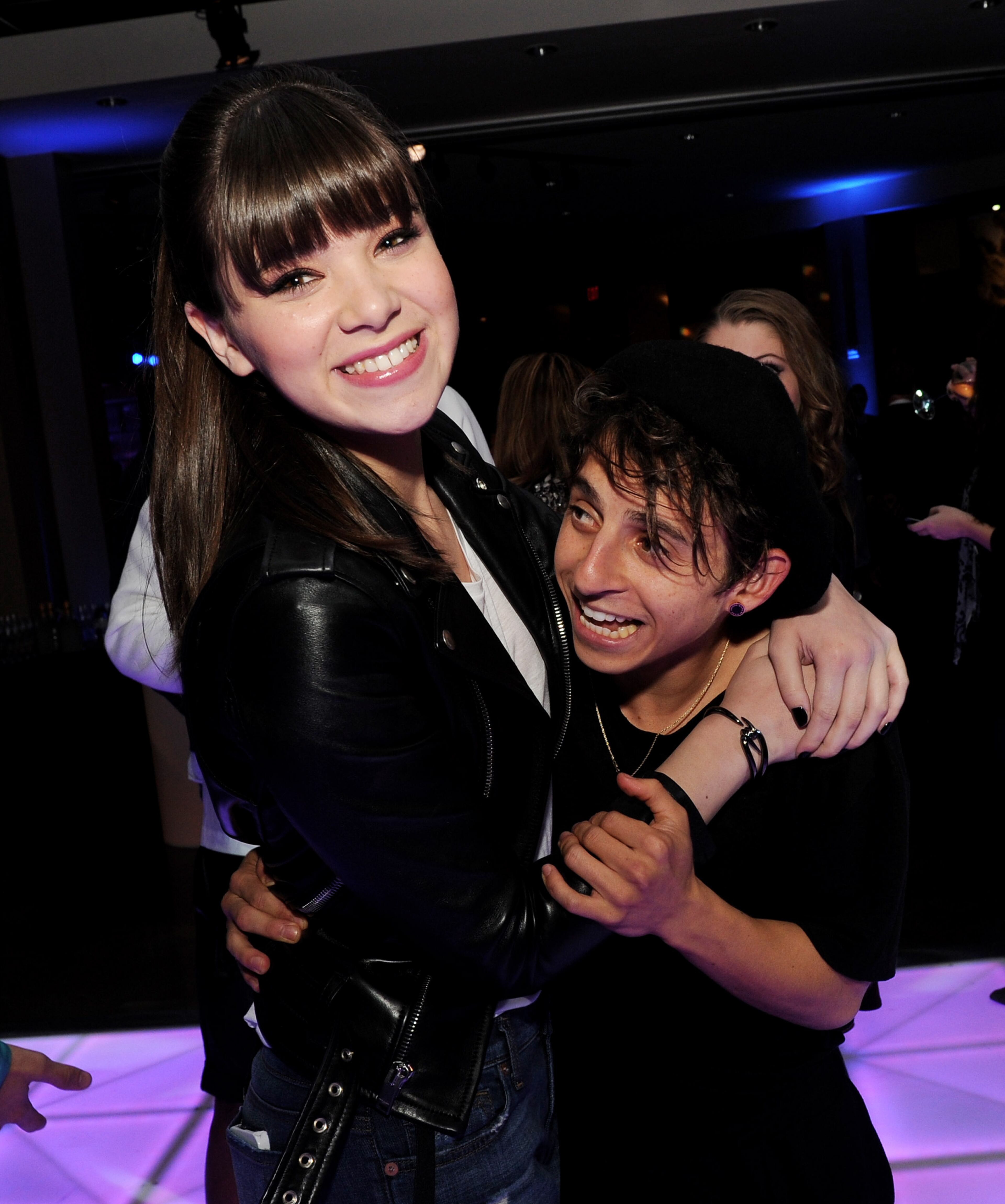 Actors Hailee Steinfeld (L) and Moises Arias pose at the after party for the premiere of Summit Entertainment's "Ender's Game" at The Annix on October 28, 2013 in Los Angeles, California. (Photo by Kevin Winter/Getty Images)