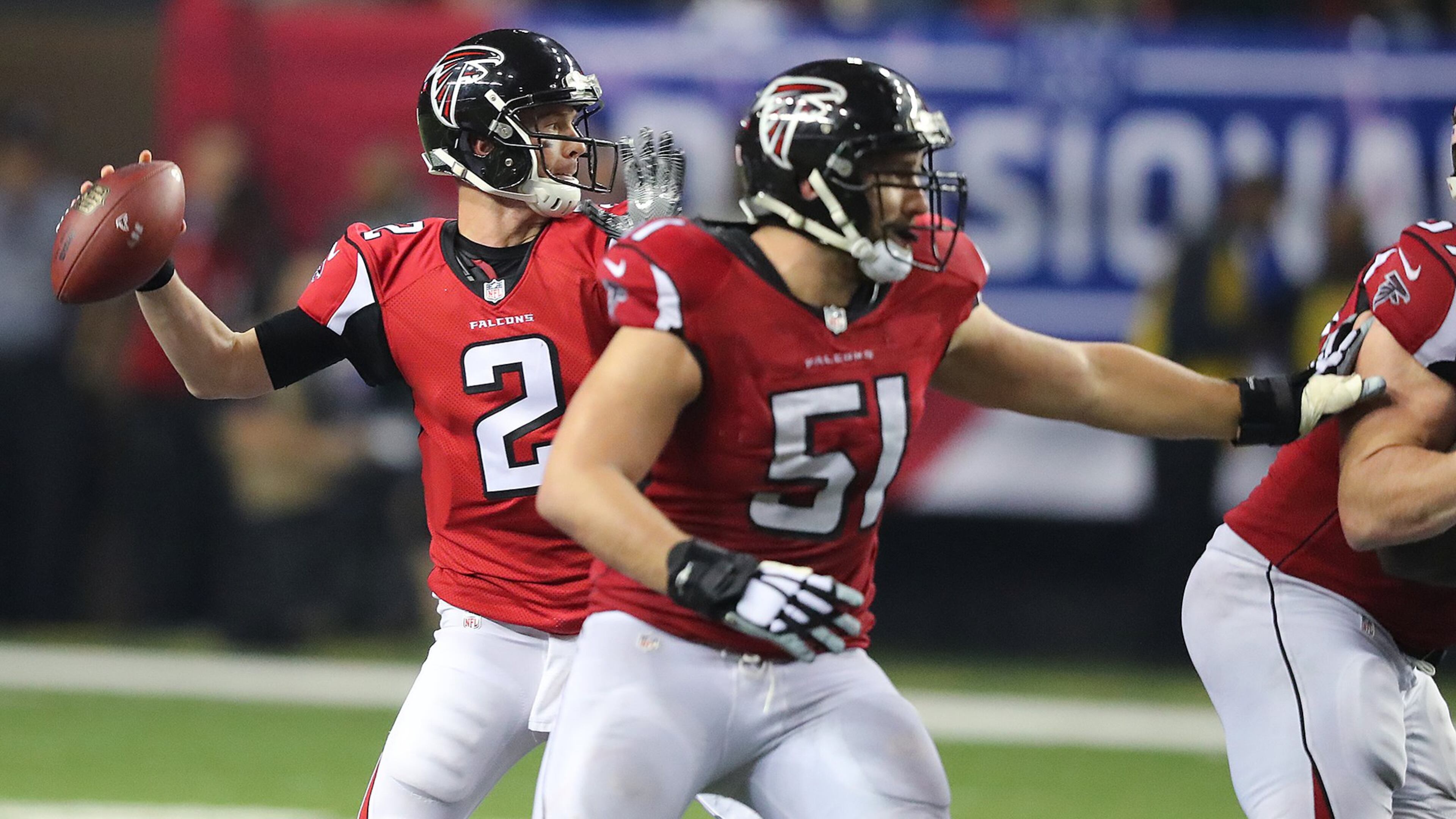 Falcons center Alex Mack gives Matt Ryan plenty of time to toss a first-down pass against the Seahawks last week. (Curtis Compton/ccompton@ajc.com)