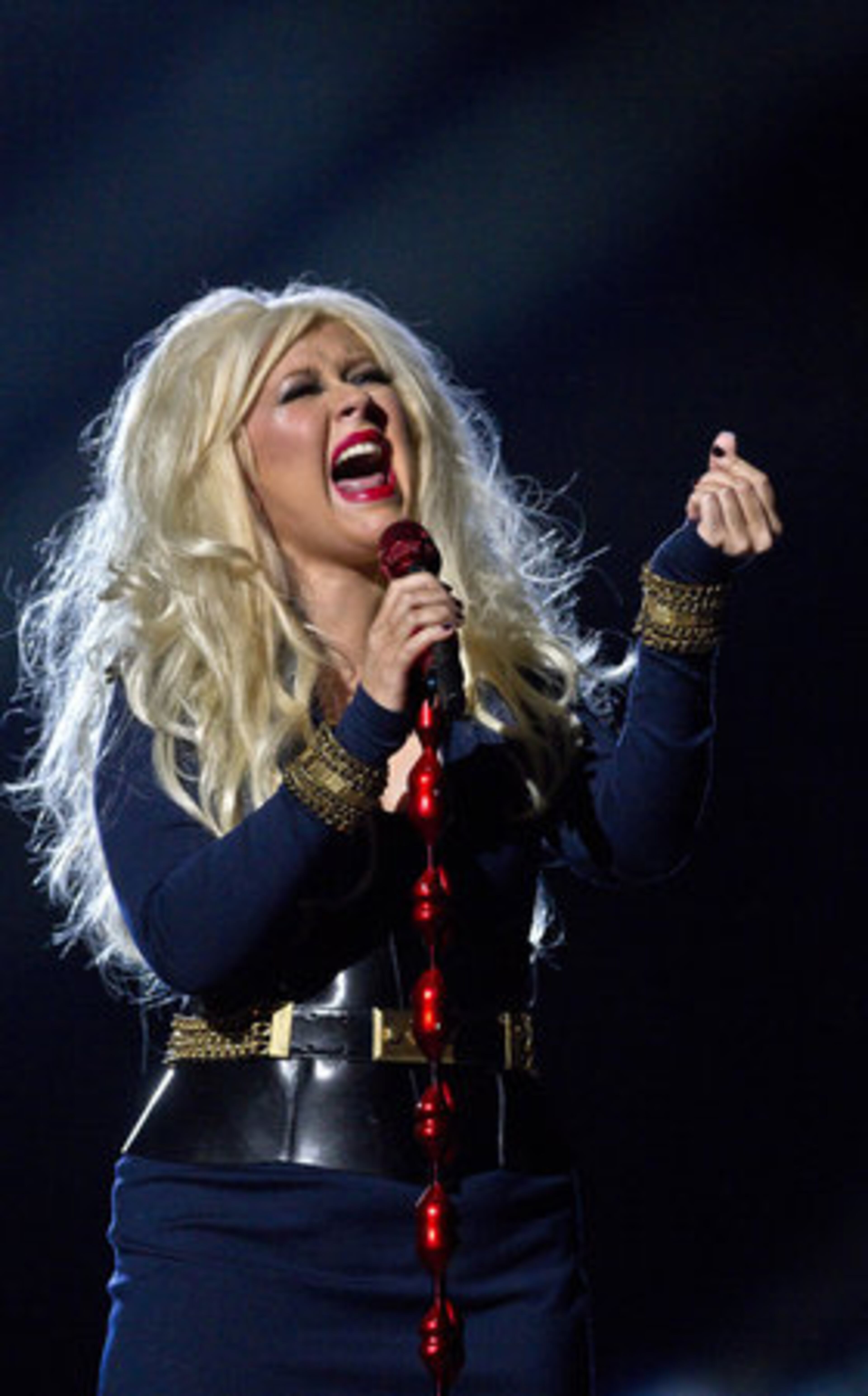 Christina Aguilera reaches for a high note as she performs at the Jackson tribute event.
