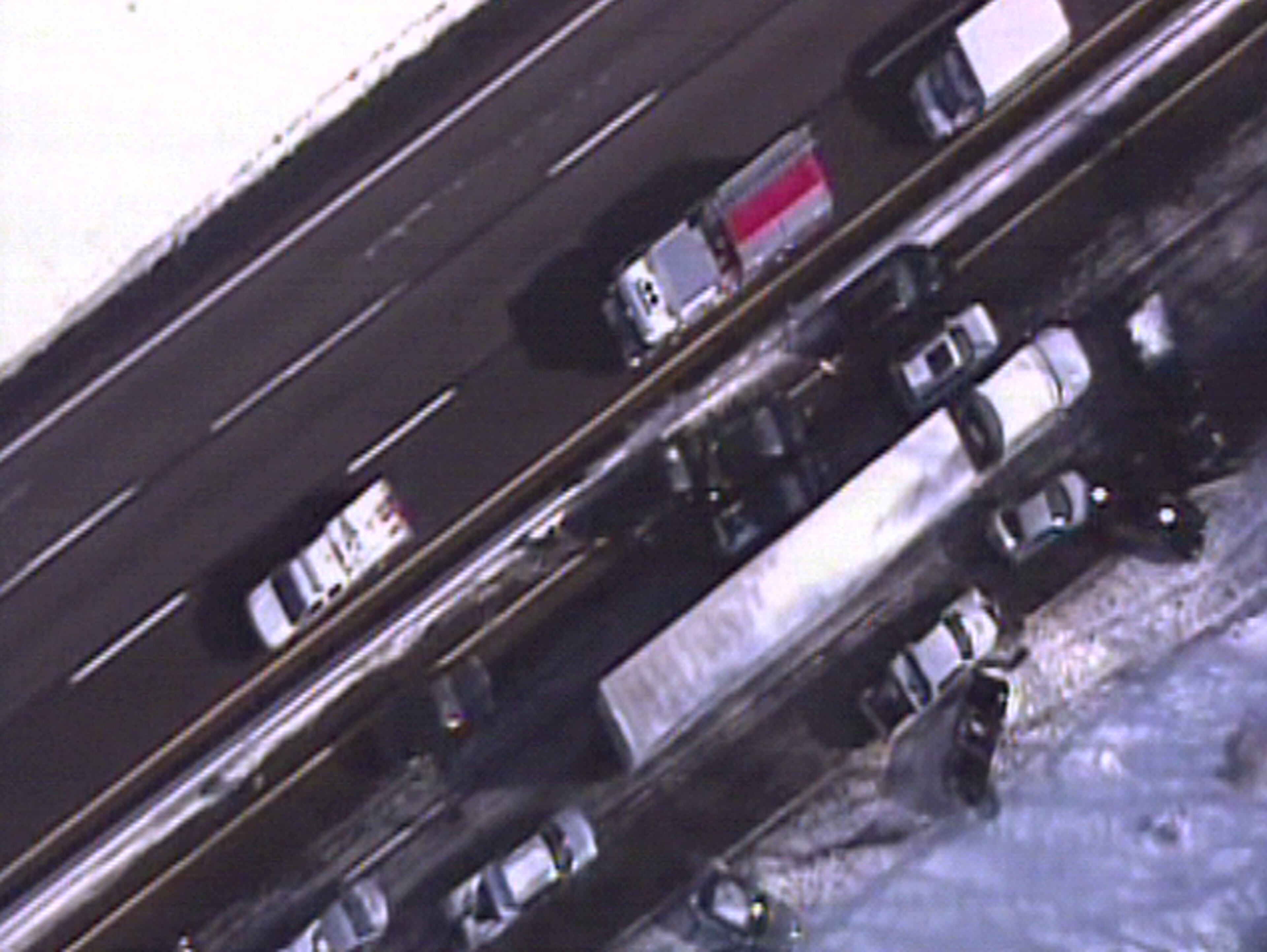 This video frame grab provided by Fox 29 Philadelphia shows traffic accidents involving multiple tractor trailers and dozens of cars on Pennsylvania Turnpike outside Philadelphia, on Friday, Feb. 14, 2014. The crashes were reported just after 8 a.m. Friday, one day after the area got about a foot of snow that left roads slick. Television news helicopter footage showed several tractor-trailers and dozens of cars involved in a series of accidents that had backed up traffic for miles between the Bensalem and Willow Grove exits. (AP Photo/Fox 29 Philadelphia)