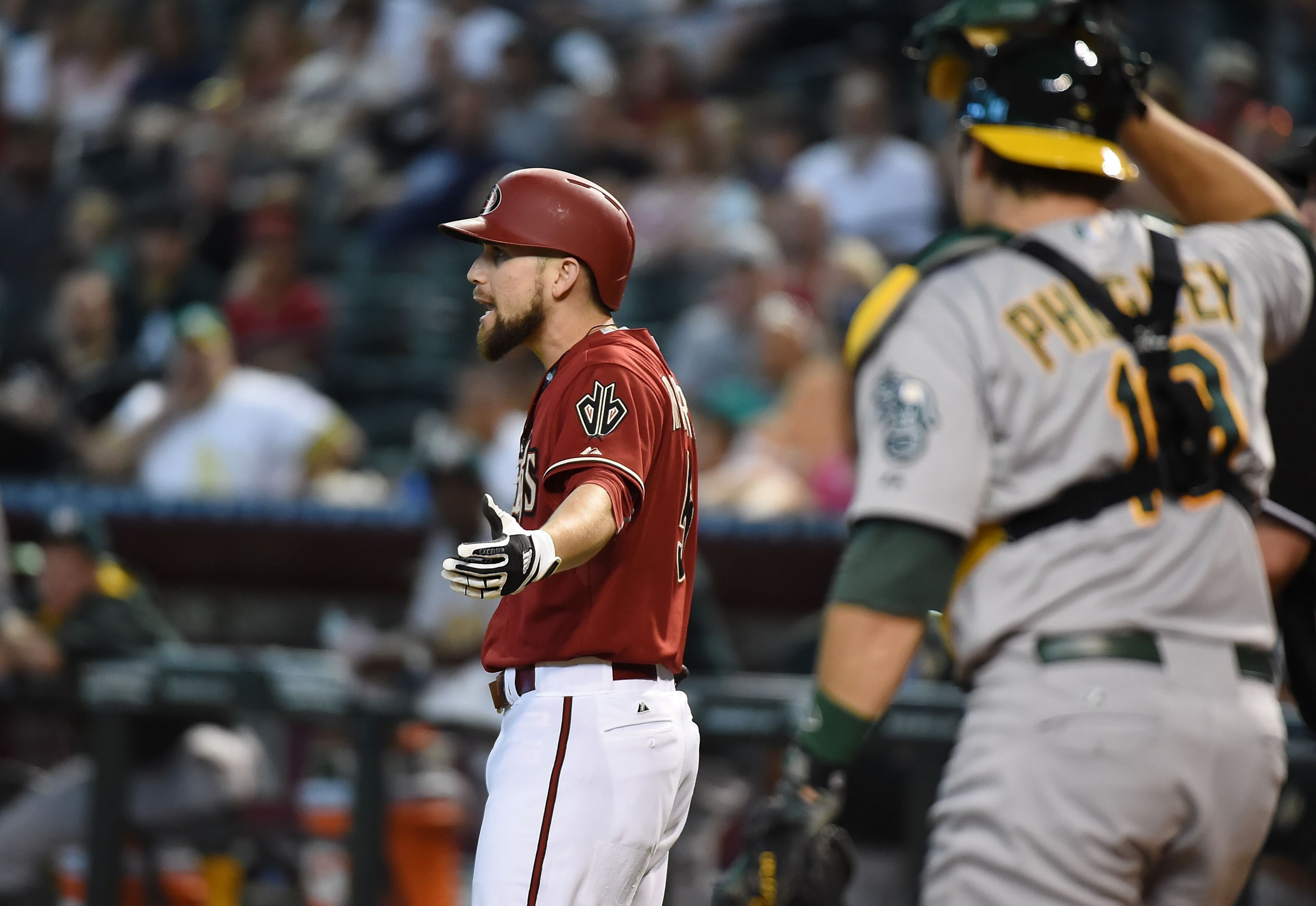 Ender Inciarte of the Arizona Diamondbacks yells at pitcher Drew Pomeranz of the Oakland Athletics after almost getting hit by a pitch in 2015. (Photo by Norm Hall/Getty Images)