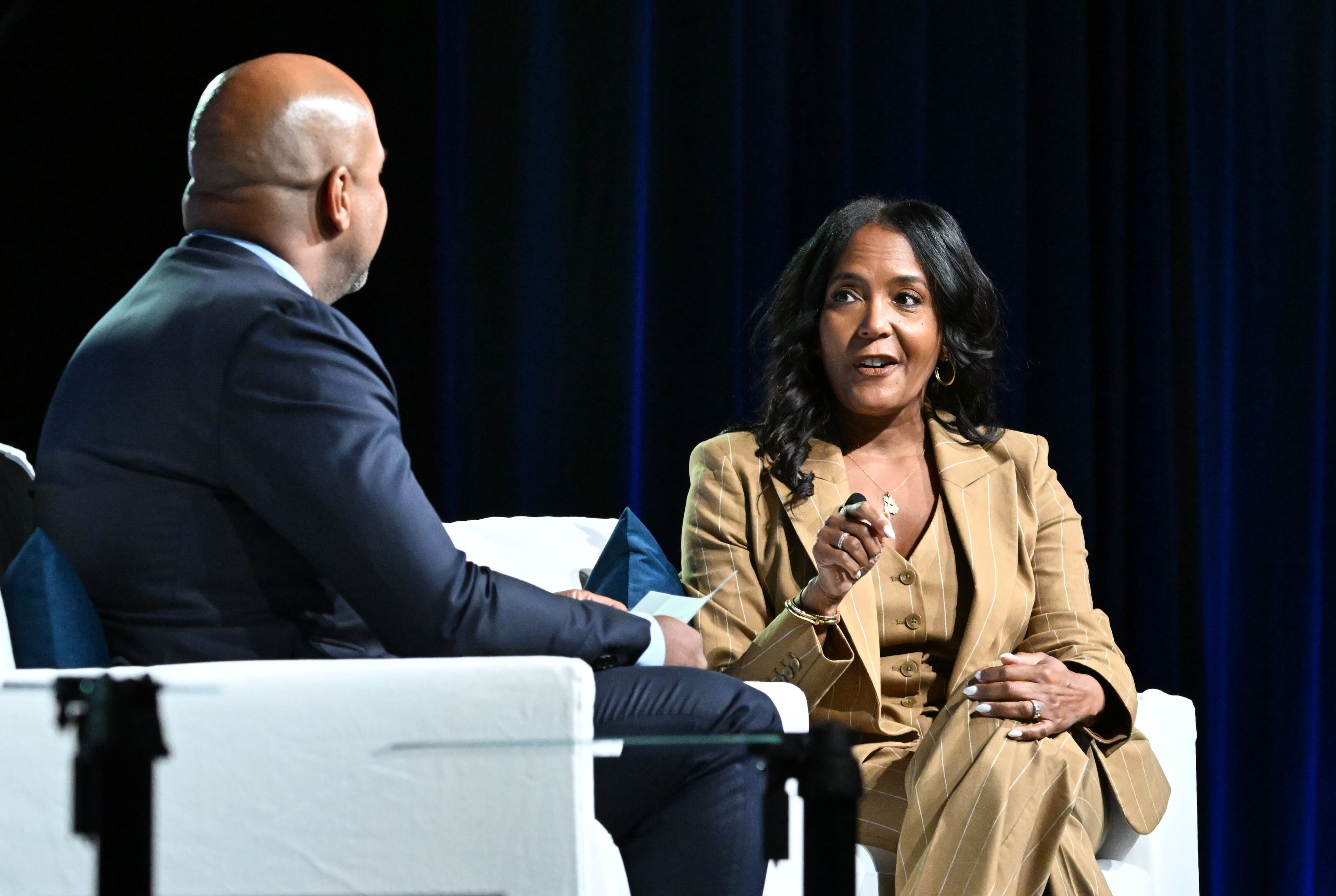 Gubernatorial candidate Keisha Lance Bottoms speaks with moderator Tharon Johnson during the Georgia Chamber’s annual congressional luncheon in Athens. Bottoms was bolstered by more than $1.6 million from the Democratic Governors Association. (Hyosub Shin/AJC)
