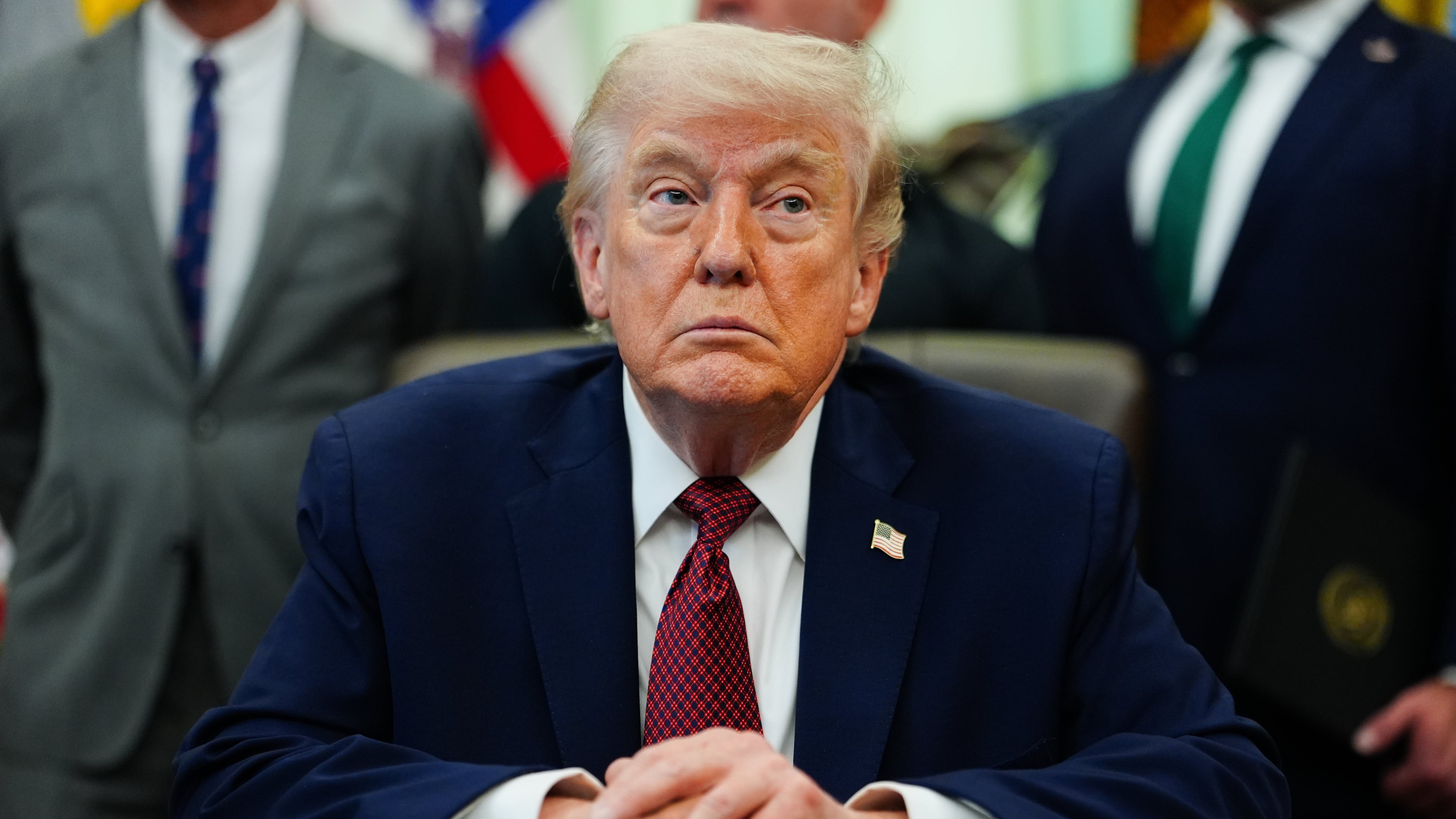 President Donald Trump listens in the Oval Office of the White House, Saturday, April 18, 2026, in Washington. (AP Photo/Julia Demaree Nikhinson)