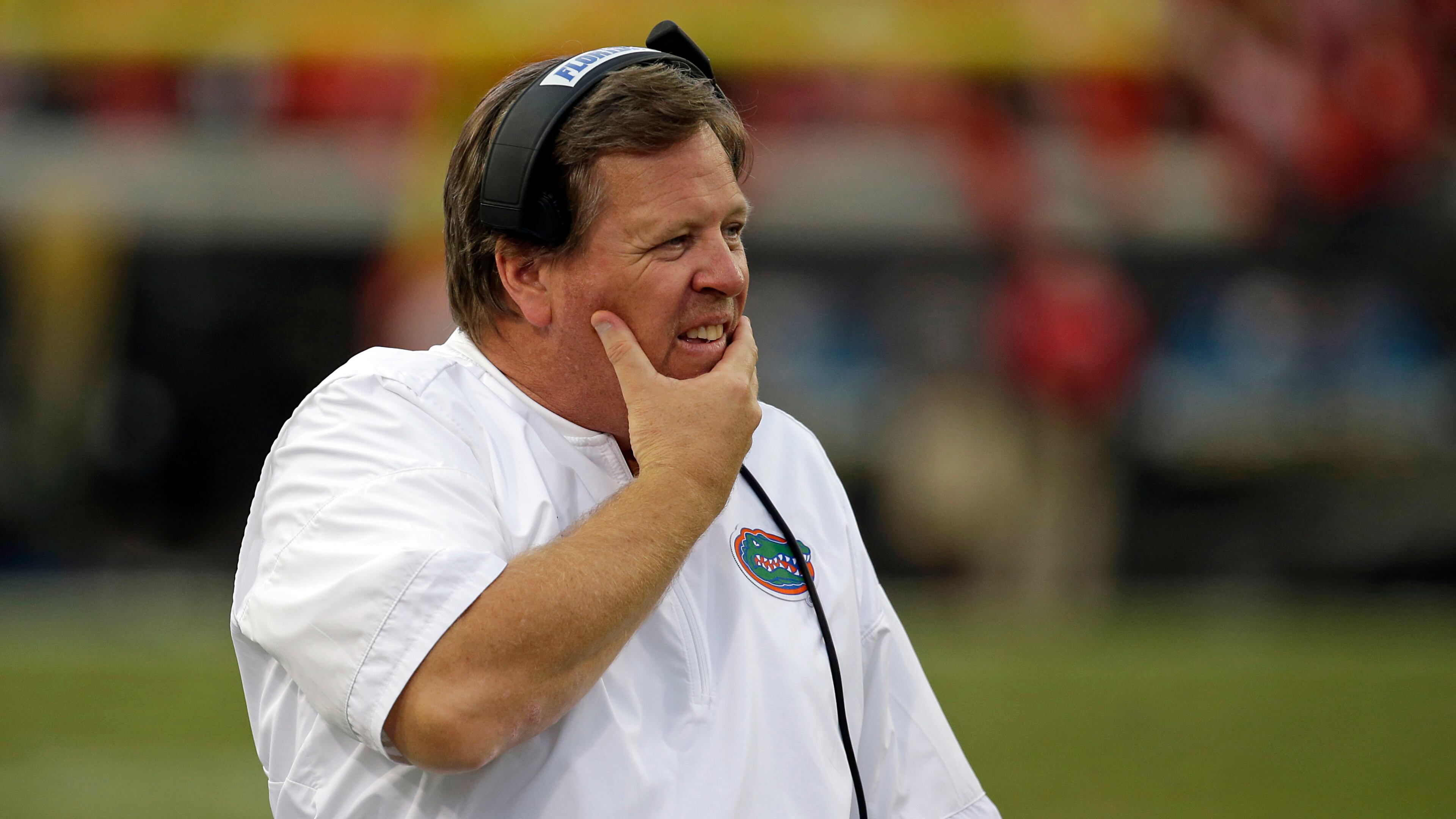 Florida head coach Jim McElwain walks the sideline in the second half against Georgia, Saturday, Oct. 28, 2017, in Jacksonville, Fla. Georgia won 42-7.