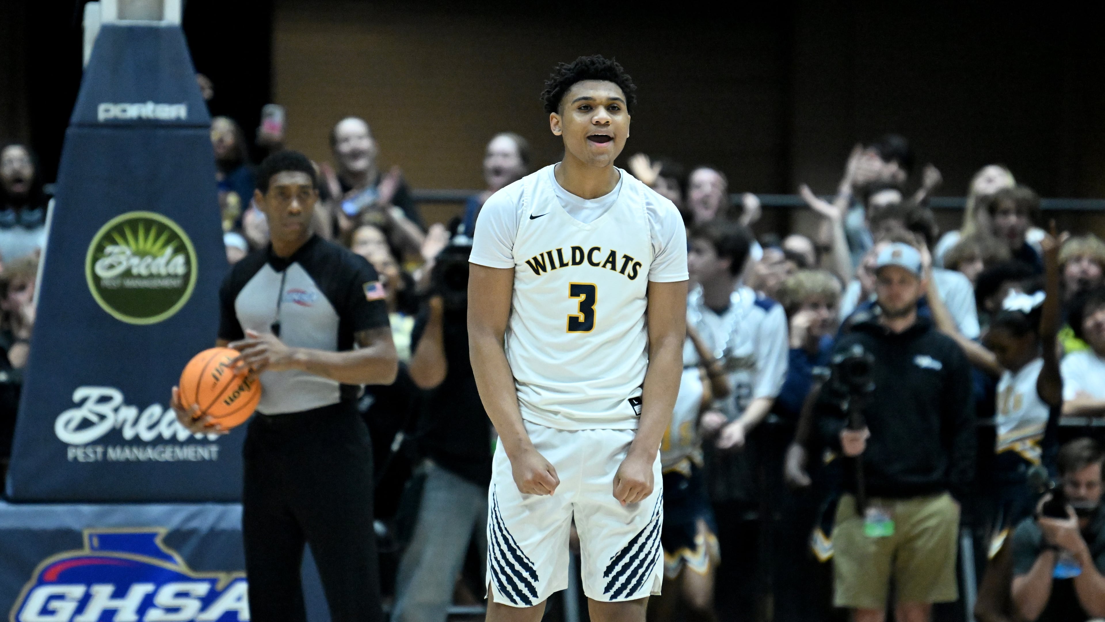 Wheeler's Colben Landrew (3) reacts after scoring a free throw at the end of the fourth quarter during the GHSA Boys 6A State Championship at the Macon Centreplex, Saturday, March 8, 2025, in Macon. Wheeler won 61-56 over Newton. (Hyosub Shin/AJC)