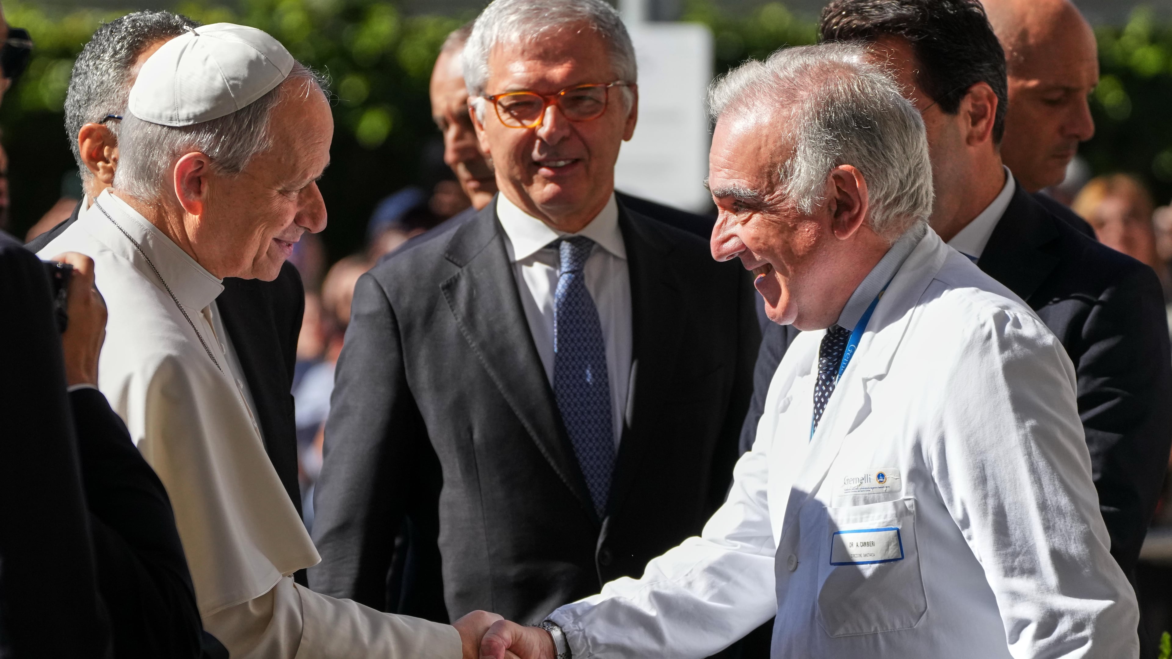 Medical Director Andrea Cambieri, right, greets Pope Leo XIV as he arrives at the Agostino Gemelli Polyclinic in Rome on Tuesday, Oct. 13, 2026, where doctors expect to operate to remove a lung nodule. (AP Photo/Gregorio Borgia)
