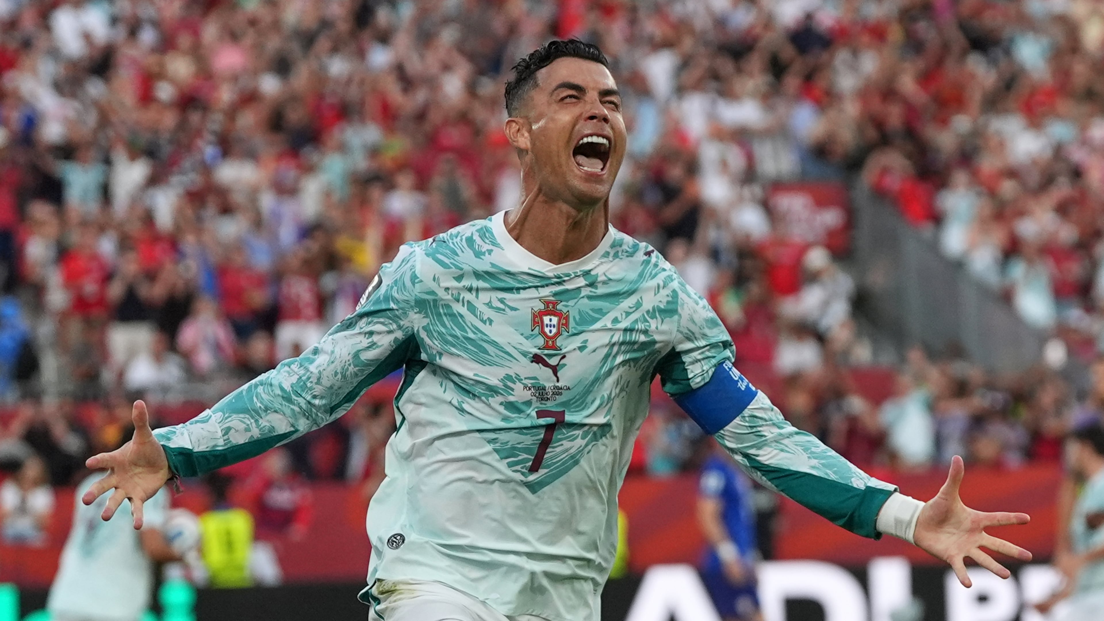 Portugal's Cristiano Ronaldo (7) celebrates after scoring their opening goal during the World Cup round of 32 soccer match between Portugal and Croatia in Toronto, Thursday, July 2, 2026. (AP Photo/Stephanie Scarbrough)