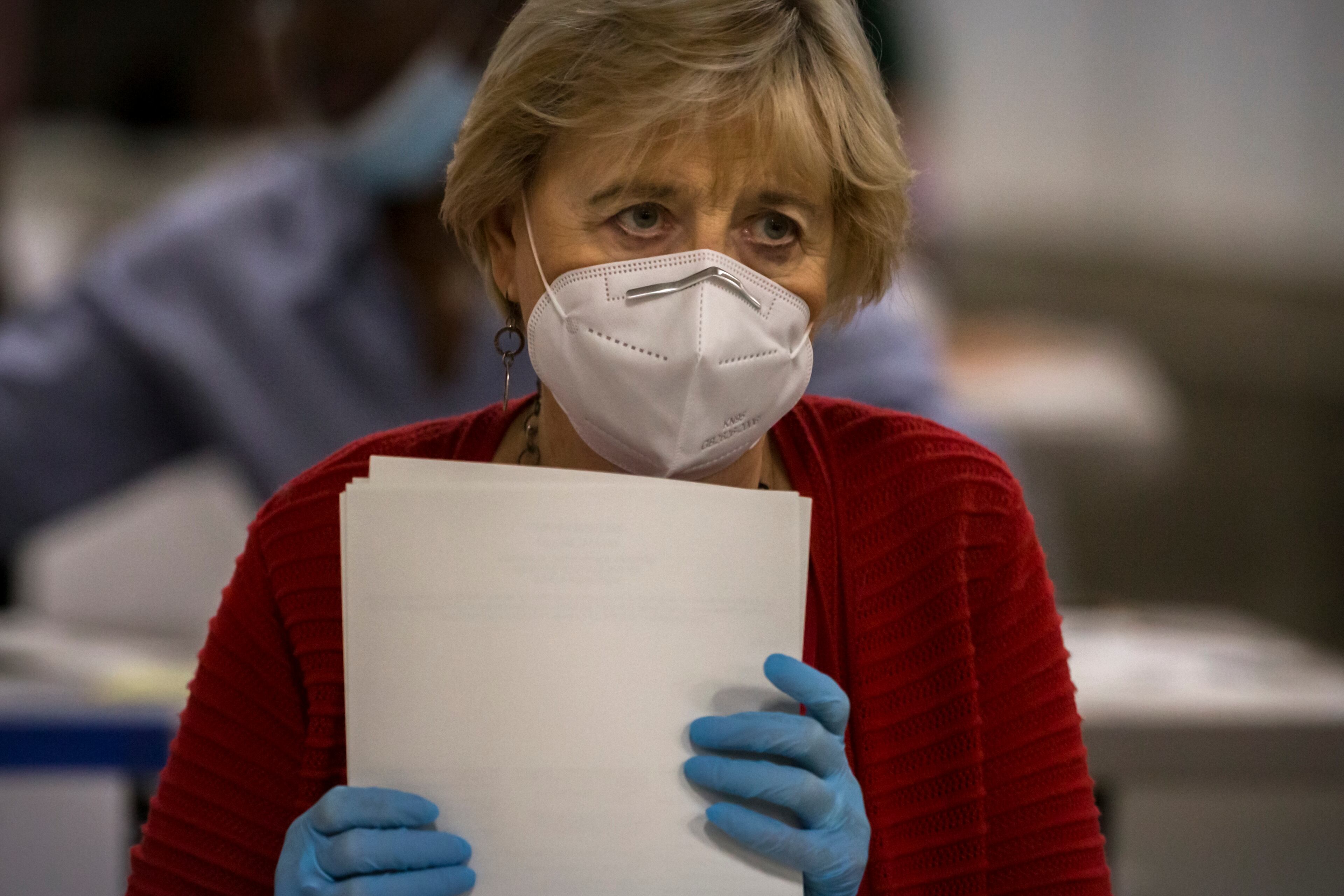 SAVANNAH, GA - NOVEMBER 14, 2020: Officials sort ballots during an audit at the Chatham County Board of Elections Annex building in Savannah, Ga. Saturday was the second full day of auditing ballots. (AJC Photo/Stephen B. Morton)