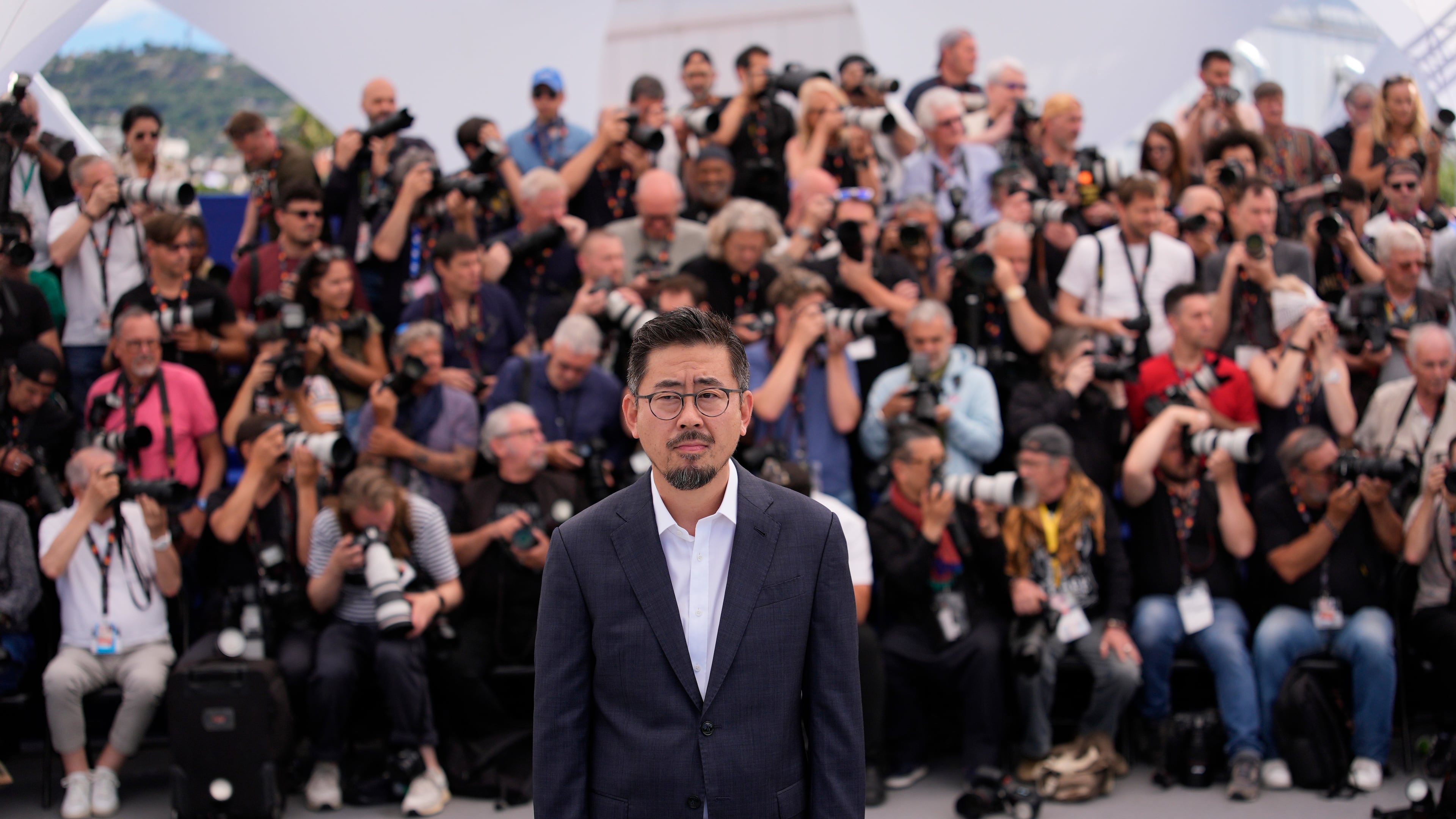Director Na Hong-jin poses for photographers at the photo call for the film 'Hope' during the 79th international film festival, Cannes, southern France, Monday, May 18, 2026. (AP Photo/John Locher)