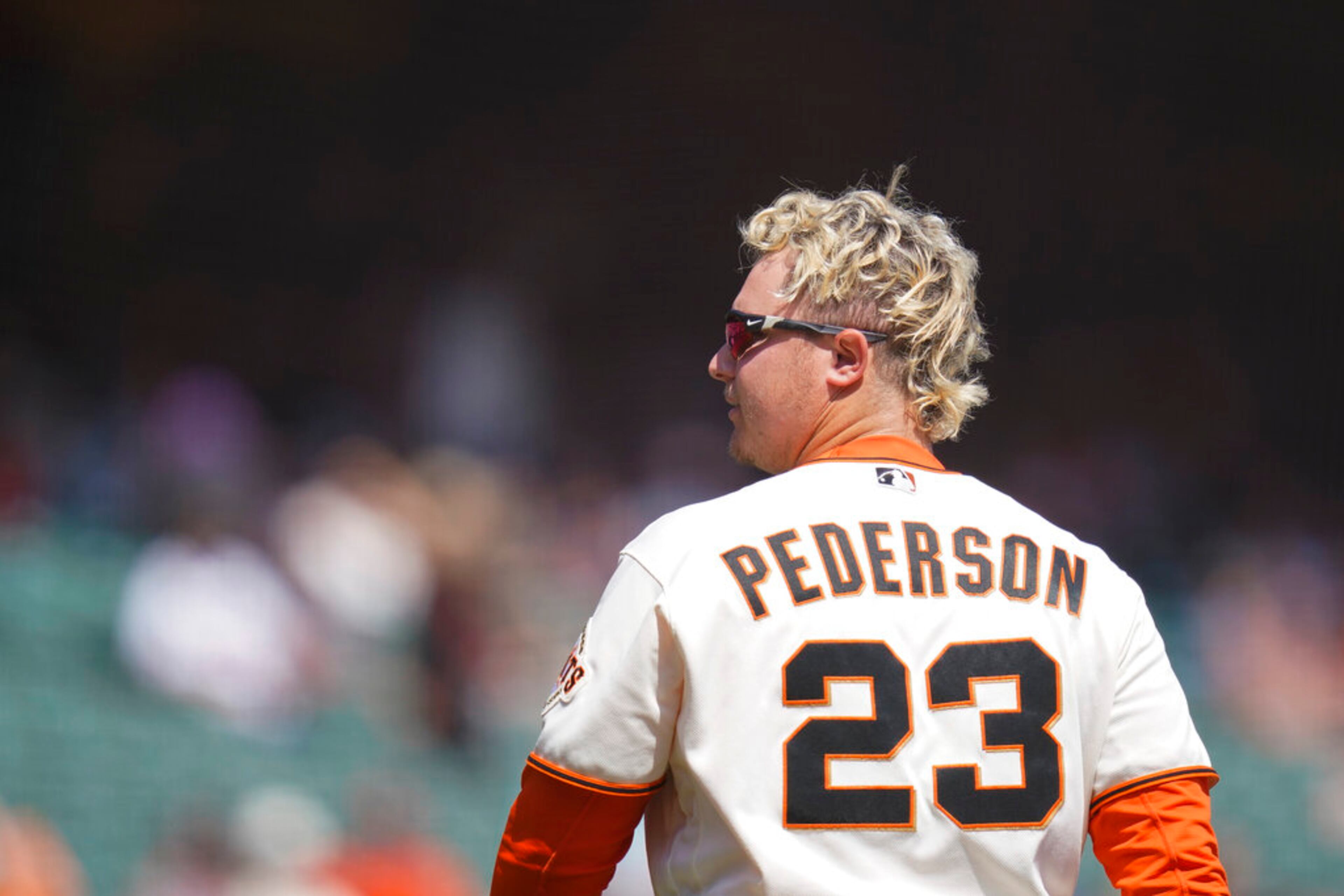 San Francisco Giants' Joc Pederson walks to the dugout after striking out against the Atlanta Braves during the first inning of a baseball game in San Francisco, Wednesday, Sept. 14, 2022. (AP Photo/Godofredo A. Vásquez)