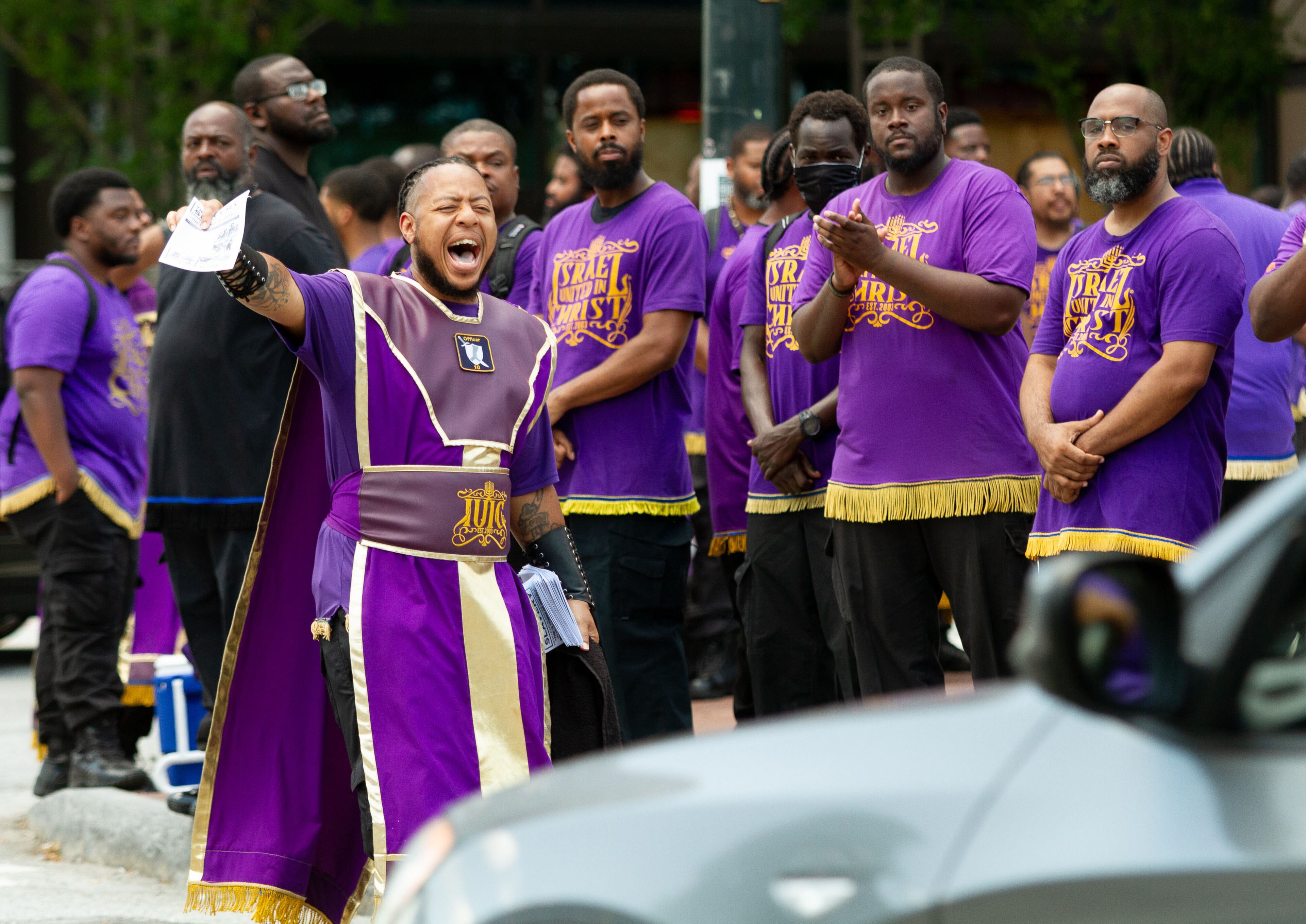 Members of Israel United in Christ hand out flyers on the corner of Olympic Park Dr and Marietta St Saturday, June 20, 2020. STEVE SCHAEFER FOR THE ATLANTA JOURNAL-CONSTITUTION
