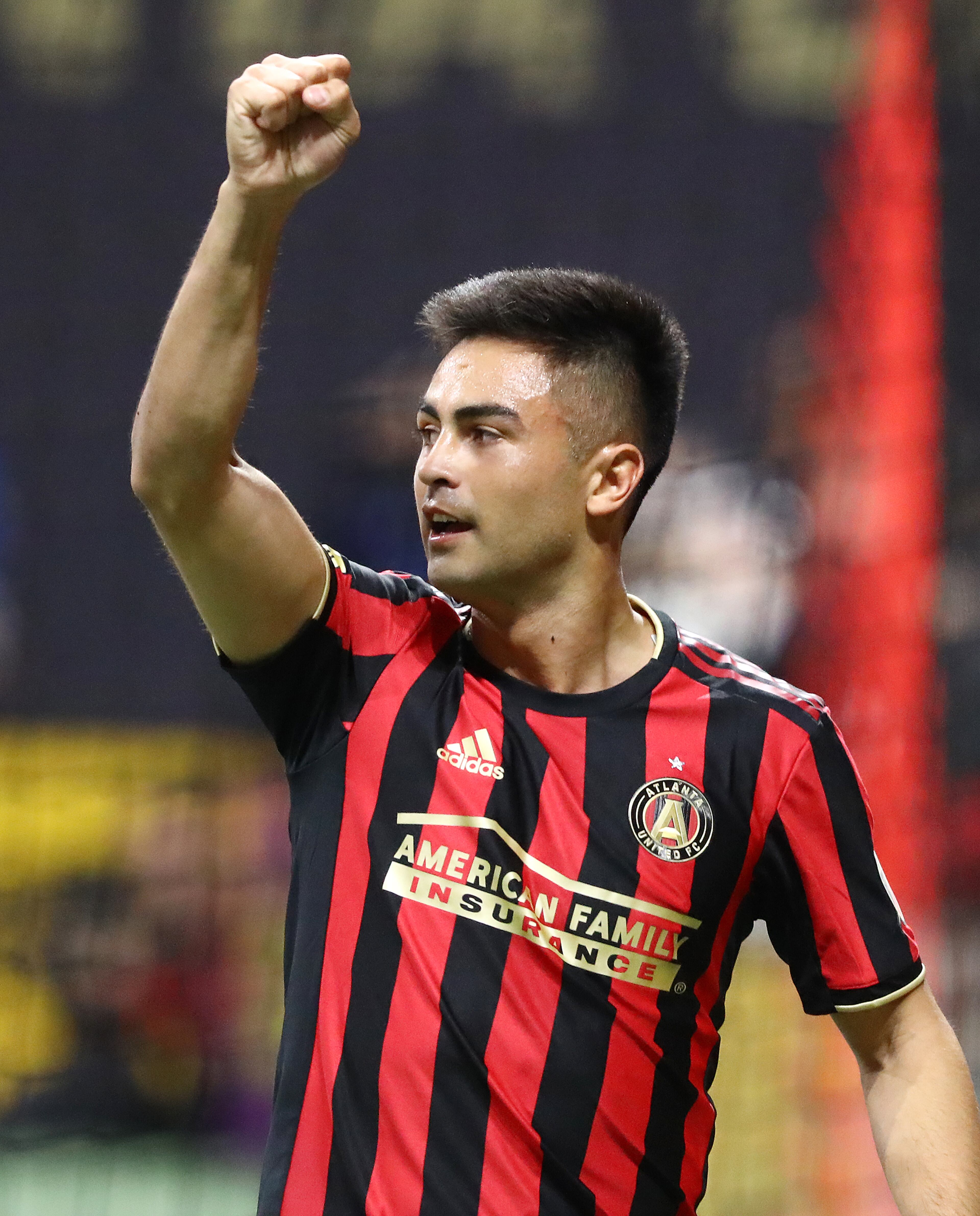 Atlanta United midfielder Pity Martinez pumps his fist after feeding the ball to Ezequiel Barco who scored against FC Cincinnati for a 1-0 lead in a MLS soccer match on Saturday, March 8, 2020, in Atlanta. Curtis Compton ccompton@ajc.com