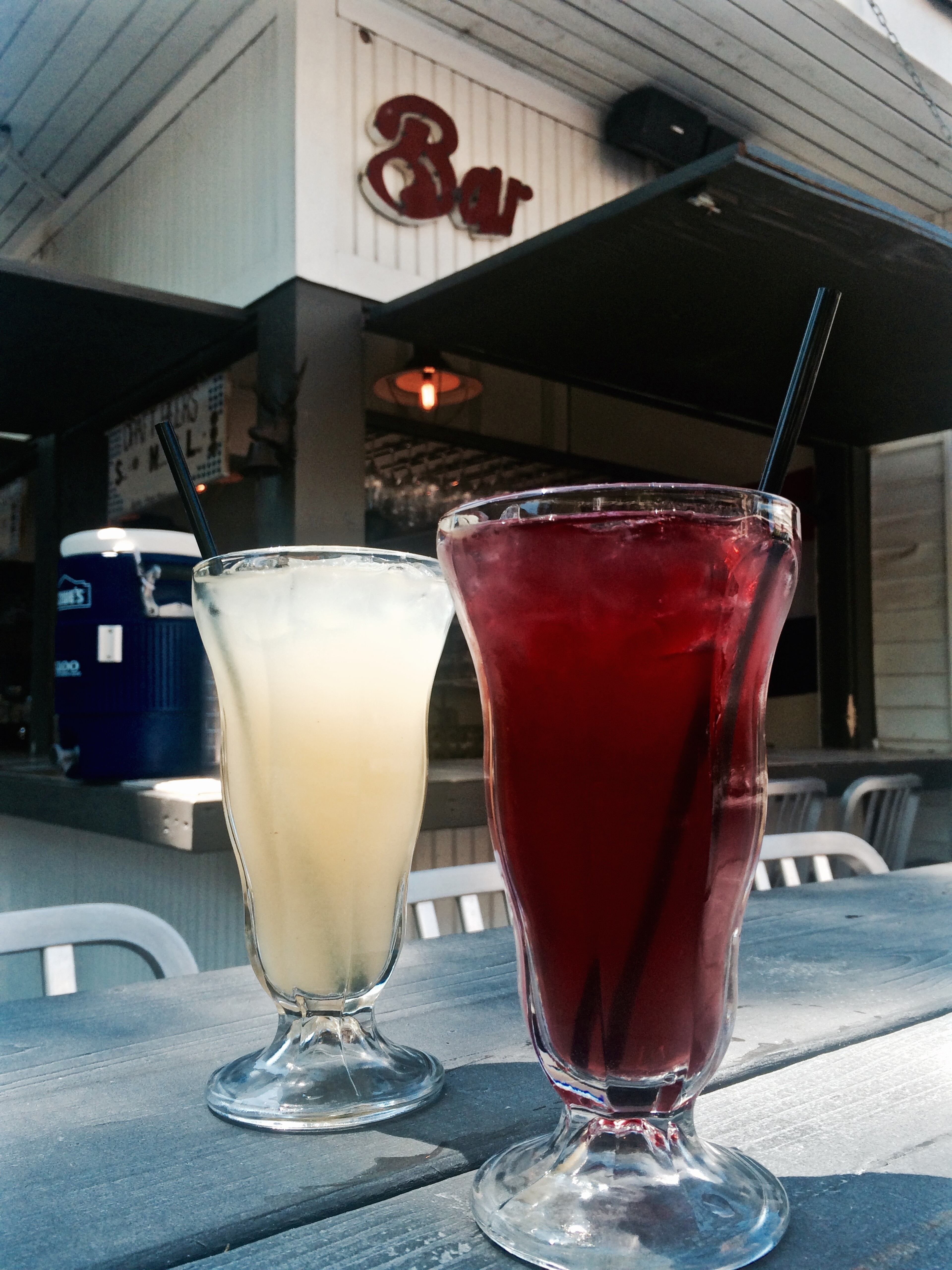 Electric Basil Lemonade (left) and Sangria are two punches that will delight cocktailians at the new Community Beer Garden at Revival restaurant in Decatur. Photo by Beth McKibben.