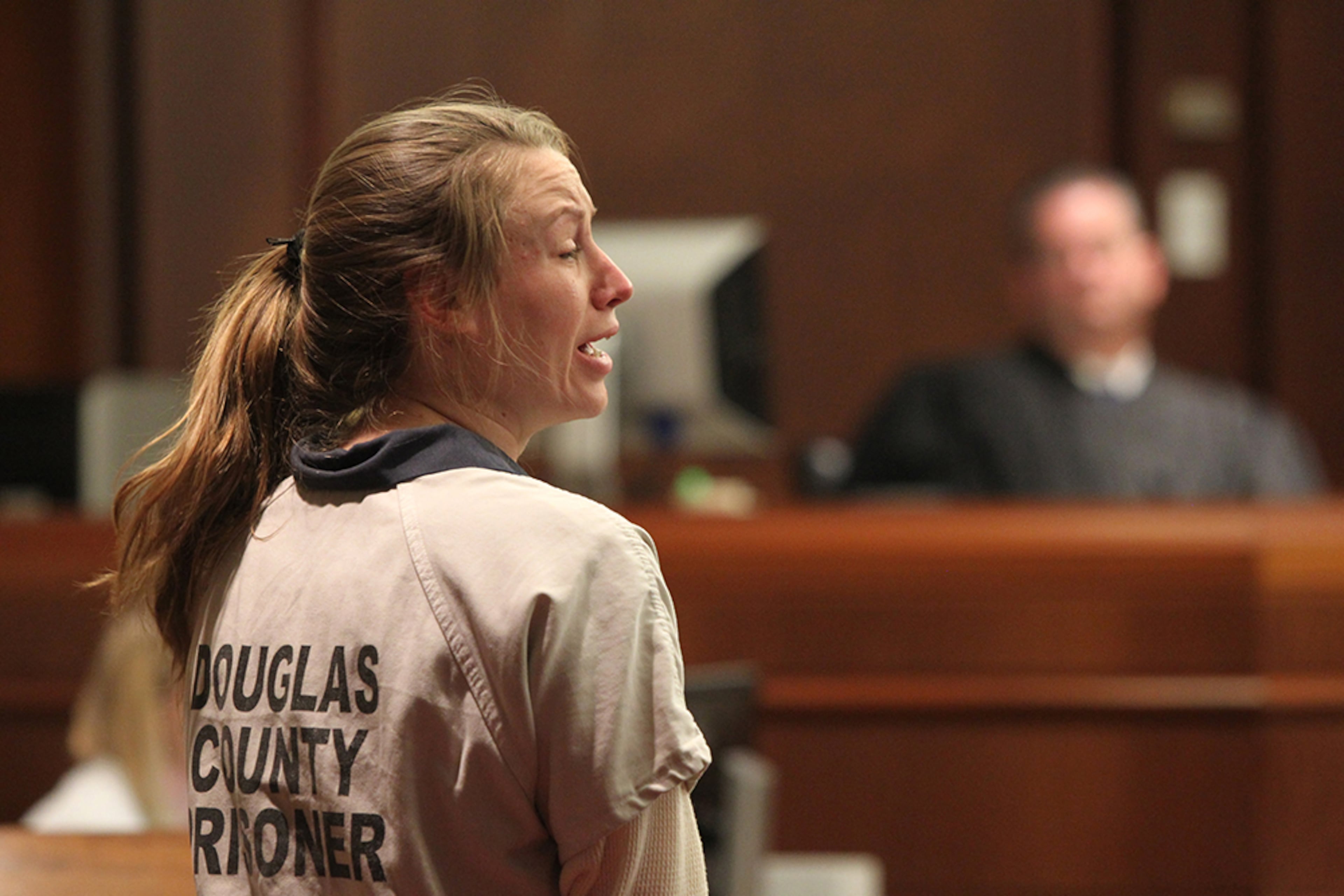 Kayla Norton stands and speaks on her own behalf in front of Superior Court Judge William McClain at the Douglas County Courthouse in Douglasville, Georgia, on Monday, February 27, 2017. Norton turns and pleads to a crowd of the victims and Hyesha Bryant, the mother of a ten year old boy who had to explain what the word "hate" meant after the events that occurred in Douglassville, Georgia, over a year ago. (HENRY TAYLOR / HENRY.TAYLOR@AJC.COM)