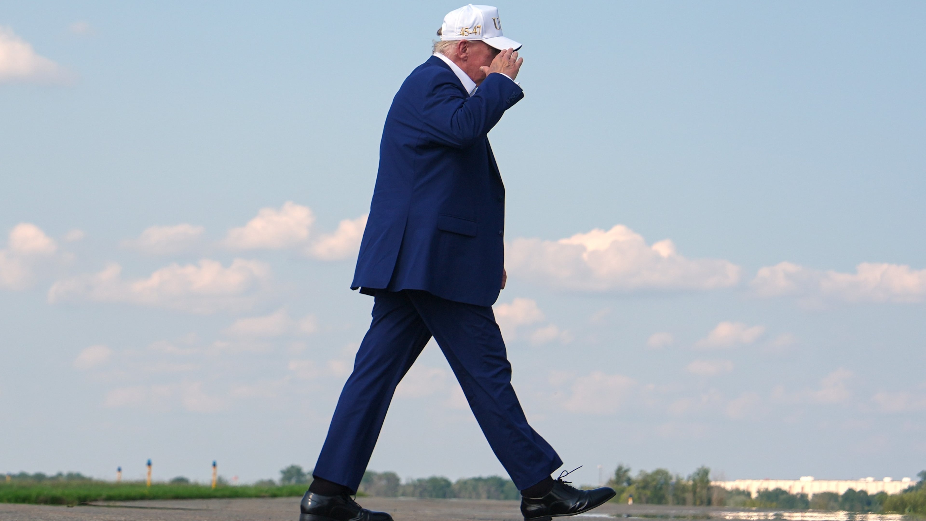 President Donald Trump walks to board Air Force One at Morristown Airport, Sunday, Aug. 9, 2026, in Morristown, N.J. (AP Photo/Julia Demaree Nikhinson)