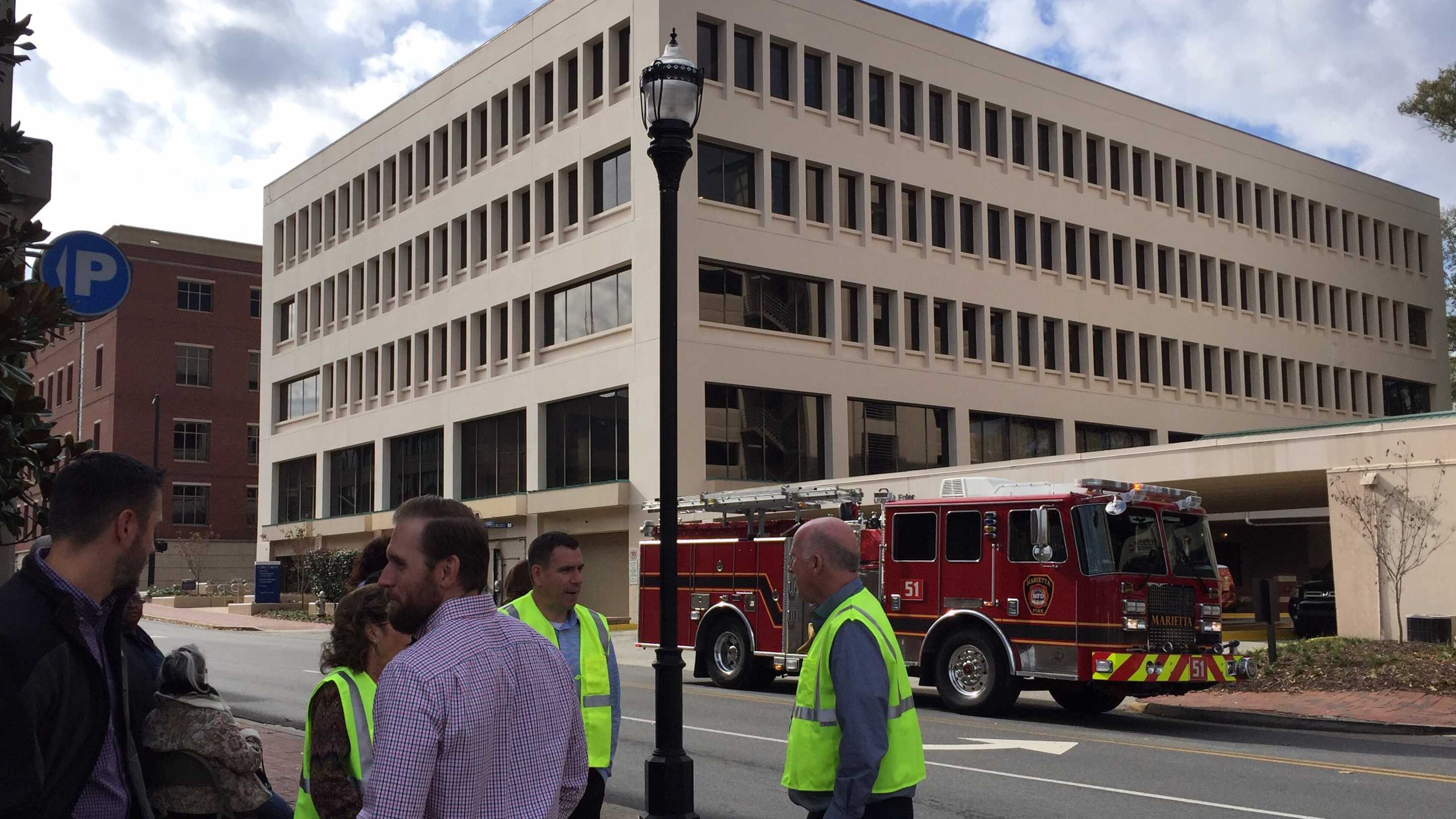 The Cobb County Government building at 100 Cherokee St. was evacuated Tuesday, after a fire started from holiday decorations accidentally lit a blaze, the county said.