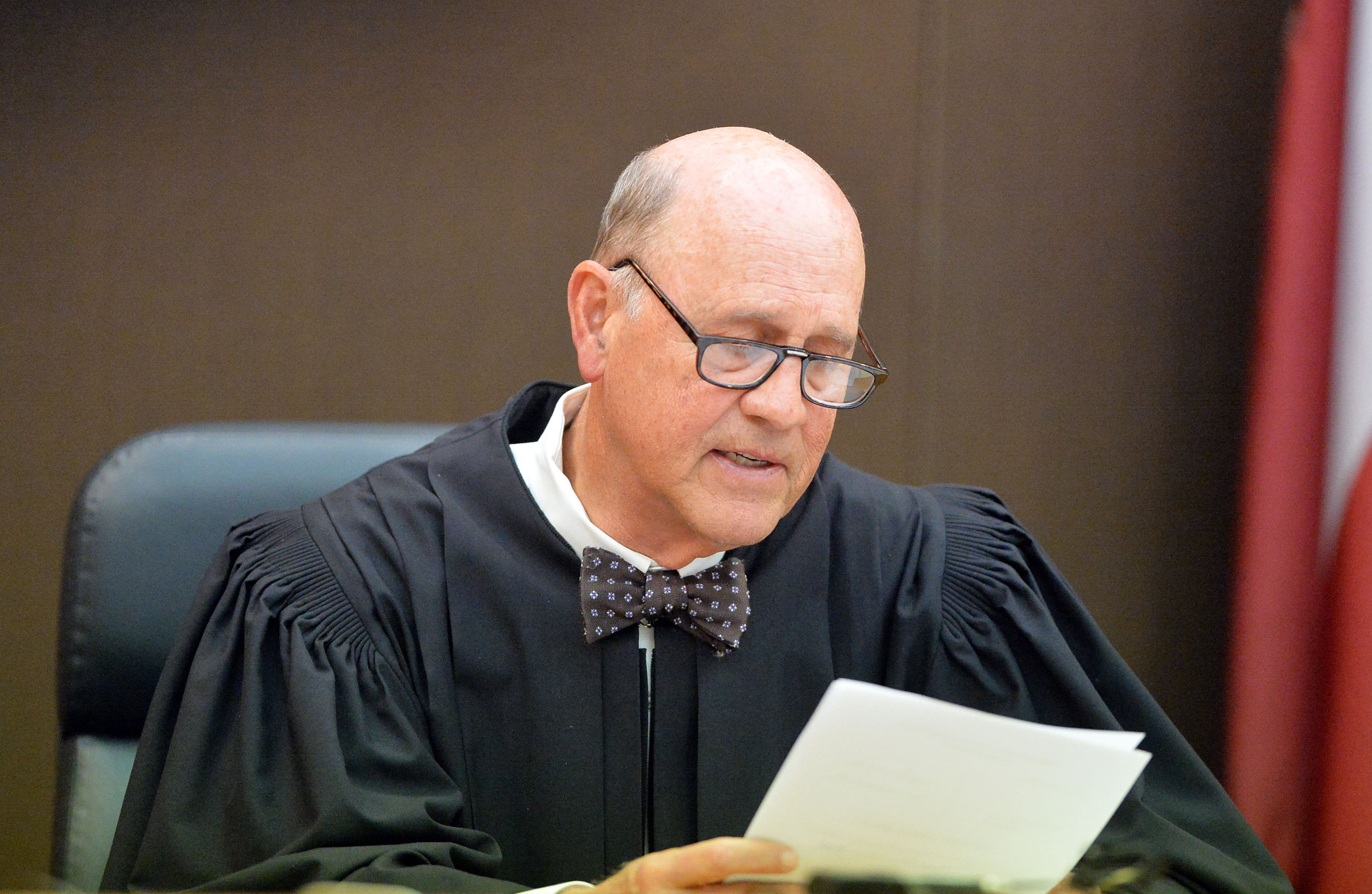 Fulton County Superior Court Judge Jerry Baxter reads the verdicts in court Wednesday. A jury of six men and six women rendered their verdicts on the eighth day of deliberations in the Atlanta Public Schools test-cheating trial on Wednesday, April 1, 2015. Jurors sorted through roughly five months of testimony against 12 former educators accused of engaging in a racketeering conspiracy to inflate test scores. (Atlanta Journal-Constitution, Kent D. Johnson, Pool)
