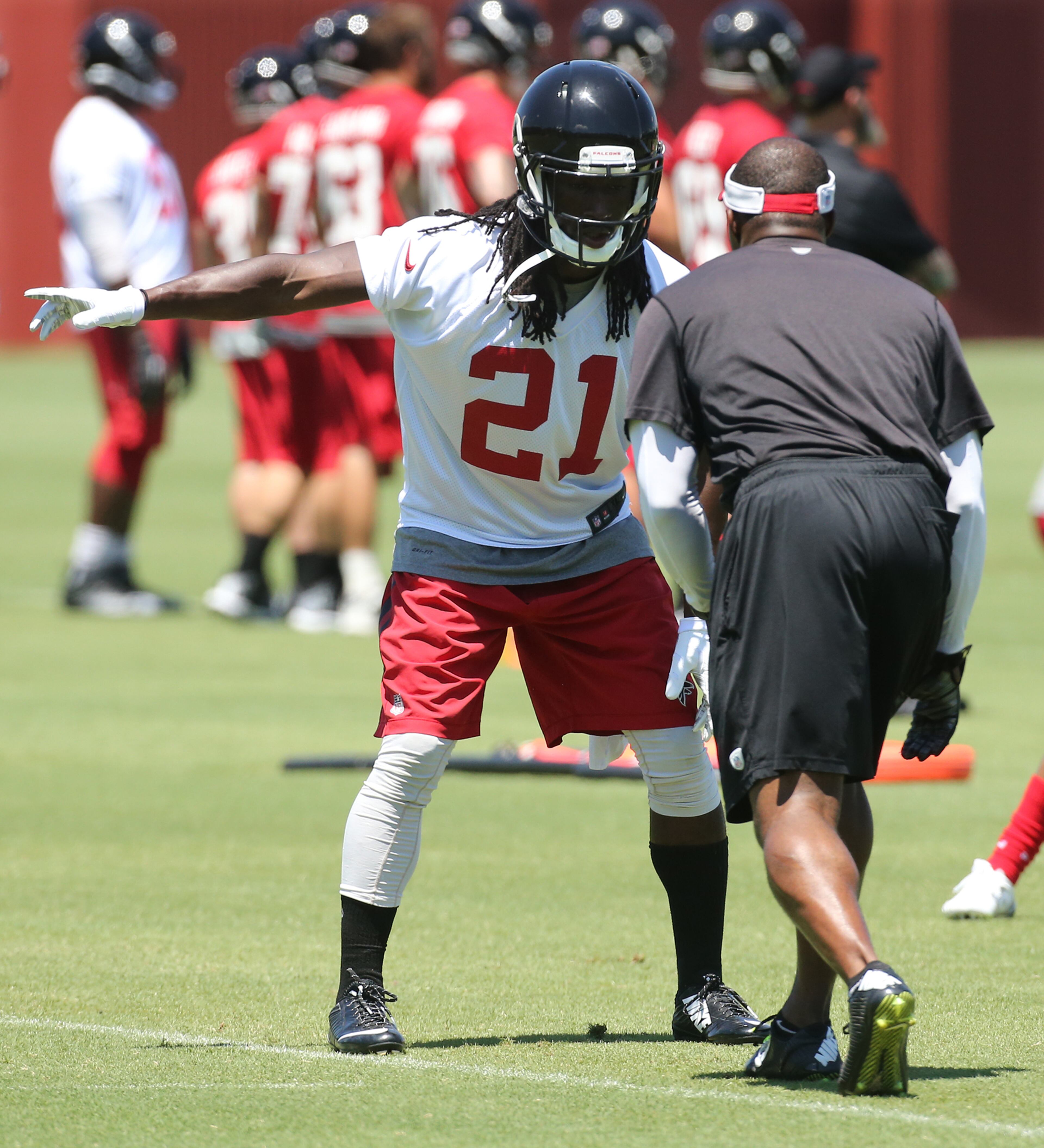 Falcons cornerback Desmond Trufant works on defensive drills with secondary coach Marquand Manuel during an OTA day on Tuesday, June 7, 2016, in Flowery Branch. Curtis Compton / ccompton@ajc.com