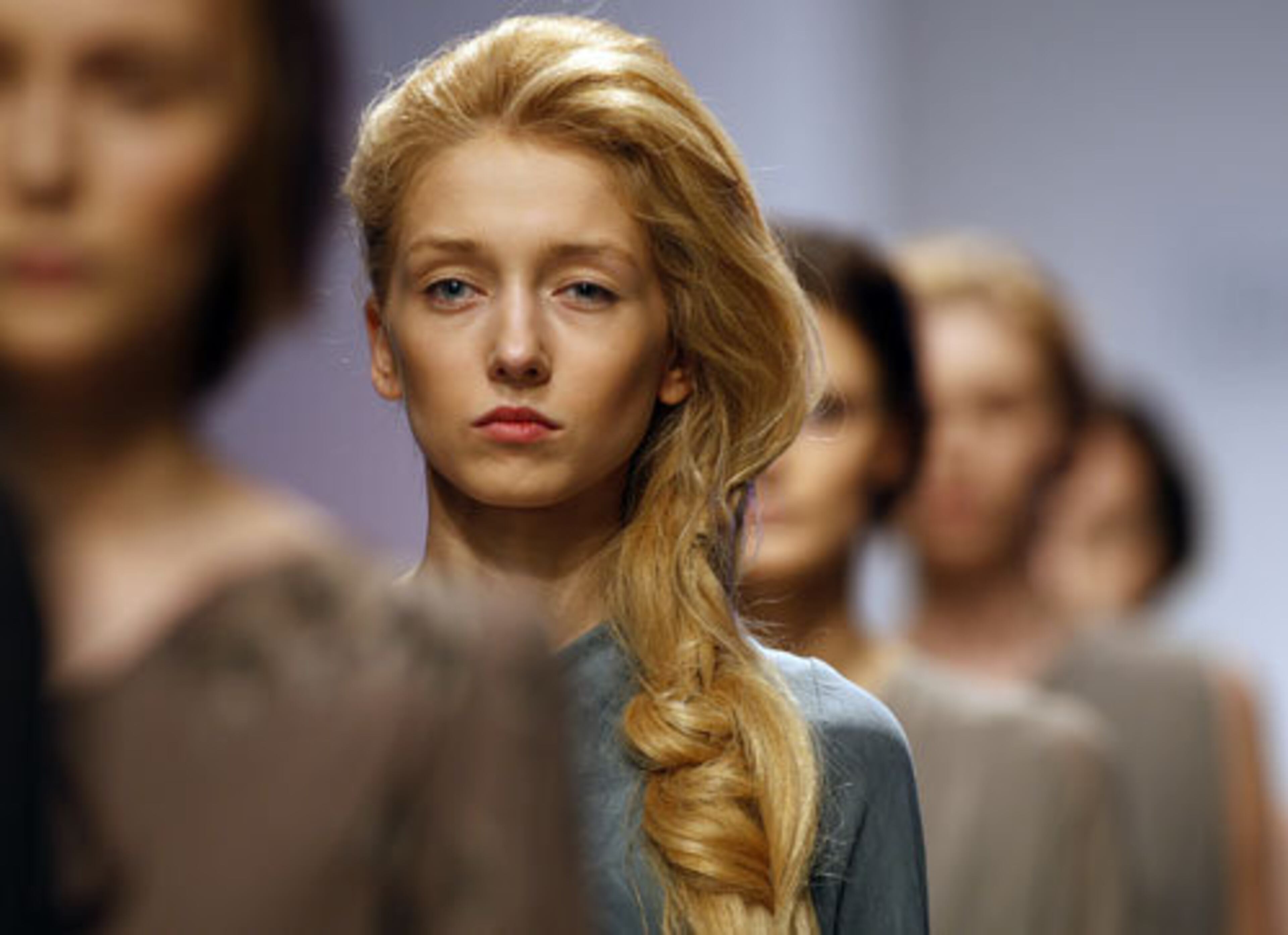 Models line up on the runway at the end of the Lena Tsokalenko show.