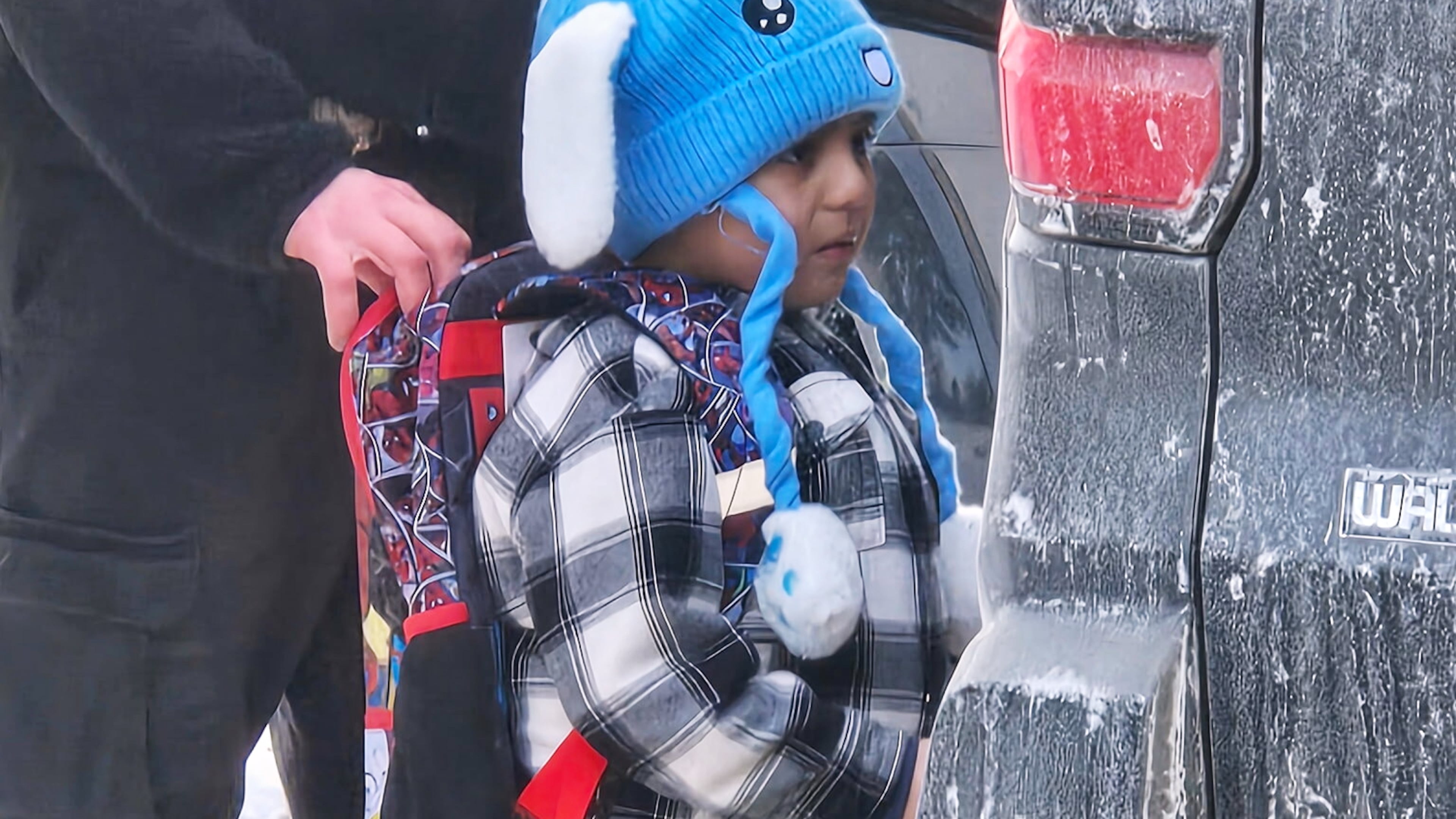 Liam Conejo Ramos, 5, is detained by U.S. Immigration and Customs Enforcement officers after arriving home from preschool, Tuesday, Jan. 20, 2026, in a Minneapolis suburb. (Ali Daniels via AP)