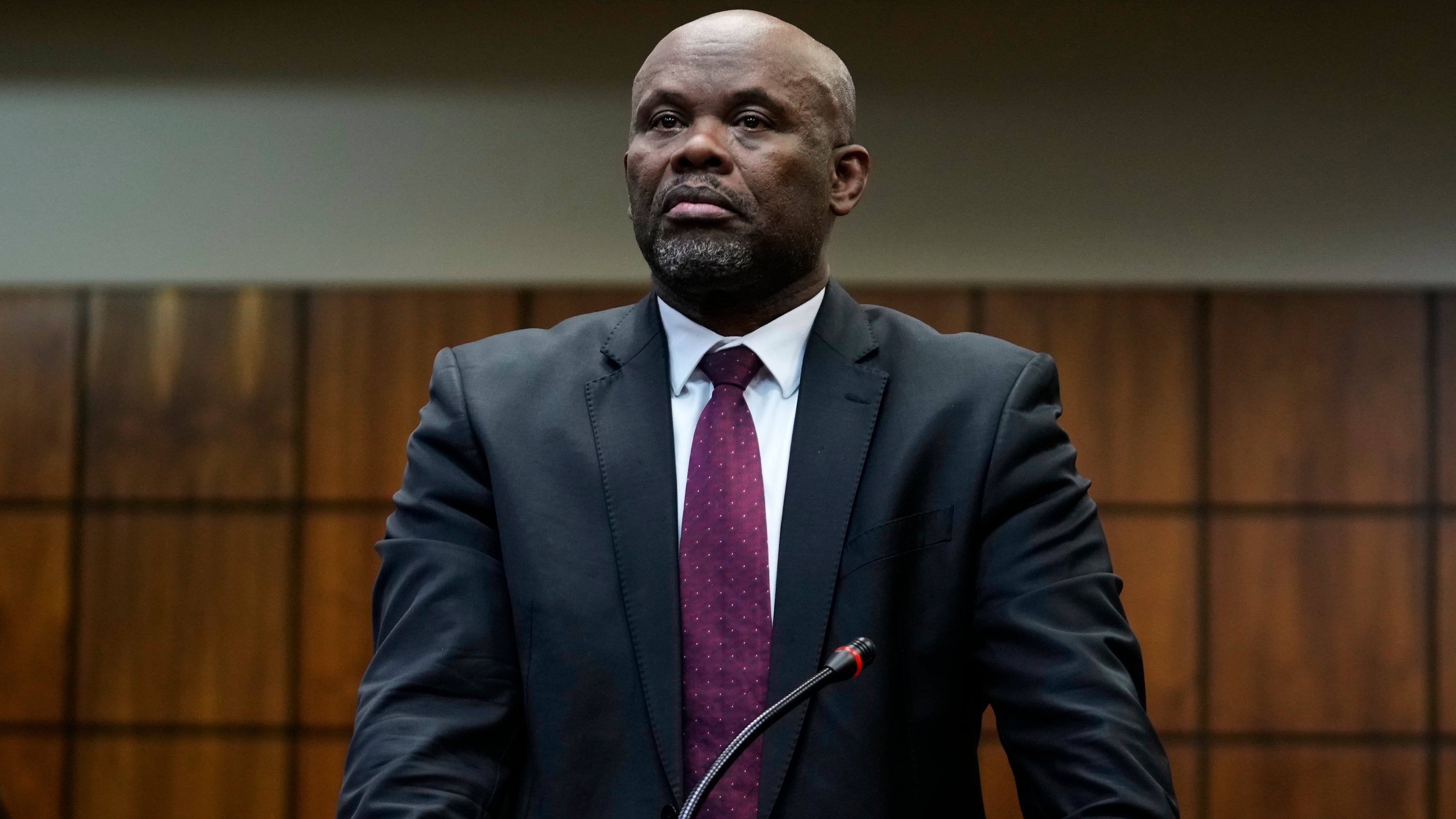 A suspended South Africa's Deputy National Police Commissioner for Crime Detection, Lt Gen Shadrack Sibiya, appears for his bail hearing at the Randburg Magistrate's Court, in Johannesburg, South Africa, Tuesday, Sept. 29, 2026. (AP Photo/Themba Hadebe)