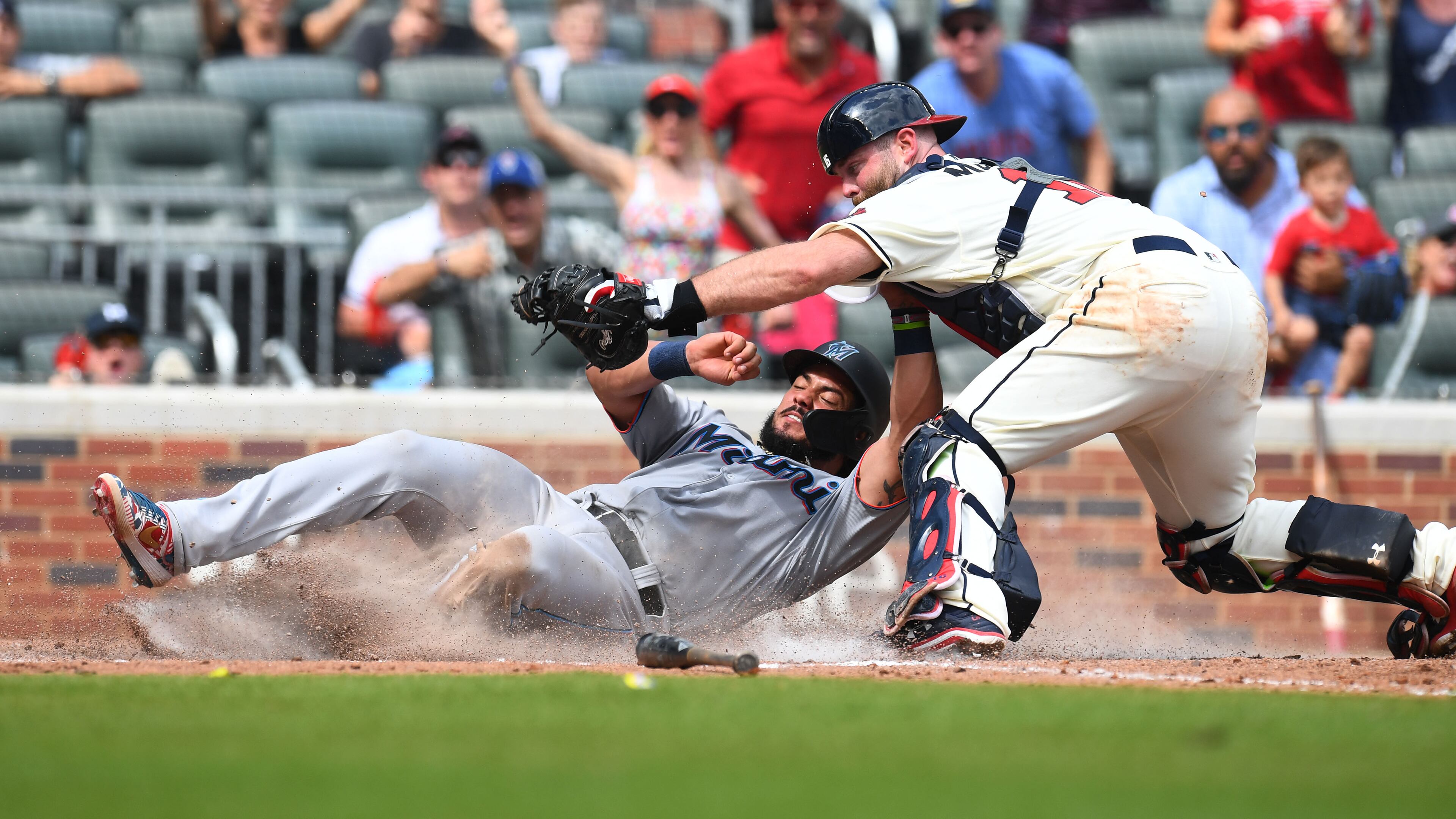 He's out! Jorge Alfaro of the Marlins is tagged out at home by Braves catcher Brian McCann while trying to score in the ninth inning of Sunday's 4-3 Braves win at SunTrust Park. (Photo by Scott Cunningham/Getty Images)