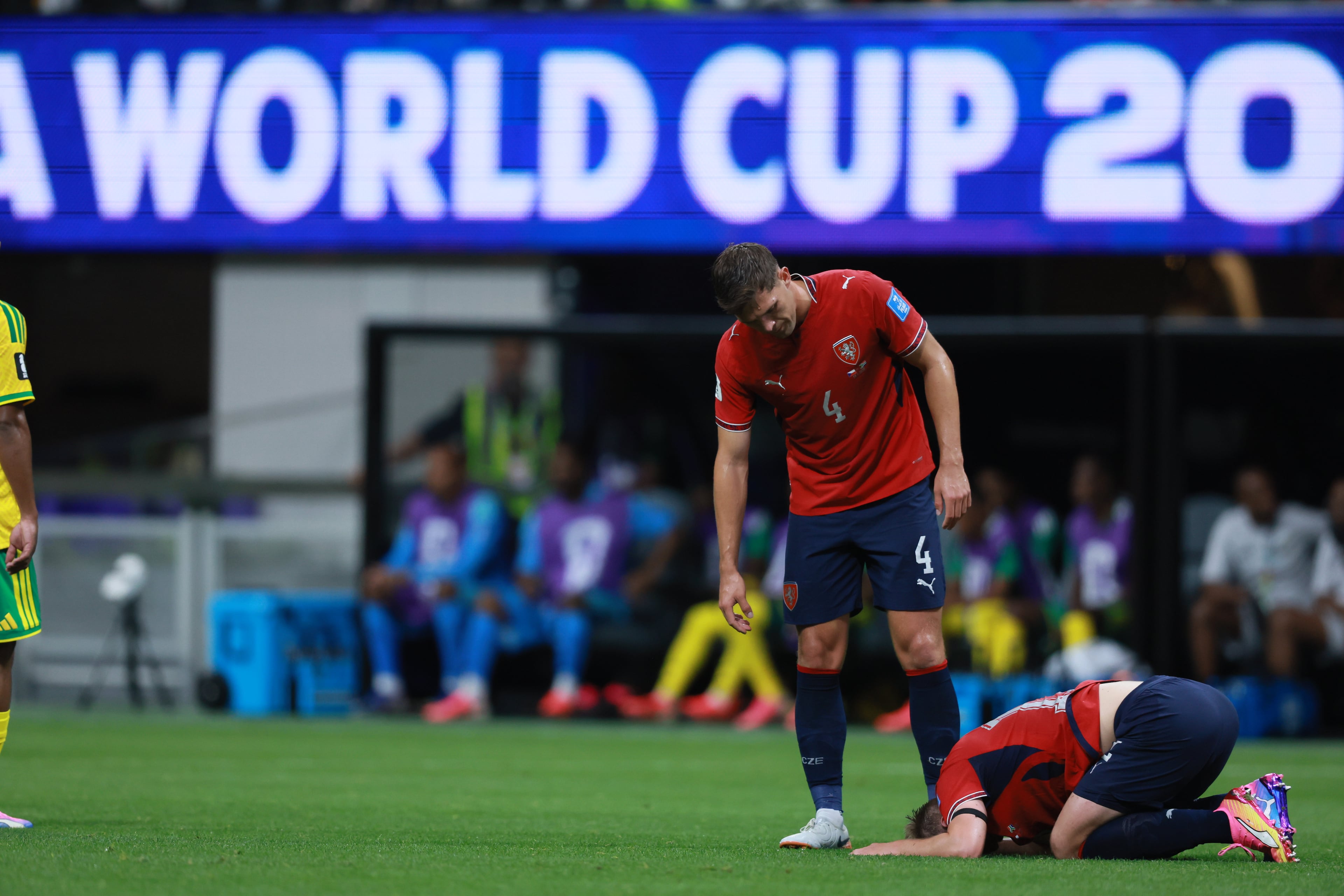 Czechia's Robin Hranac (left) checks on teammate Lukas Cerv after Cerv was fouled during the first half of the Czechia vs. South Africa game at the FIFA World Cup at Atlanta Stadium on Thursday, June 18, 2026. (Jason Getz/AJC)