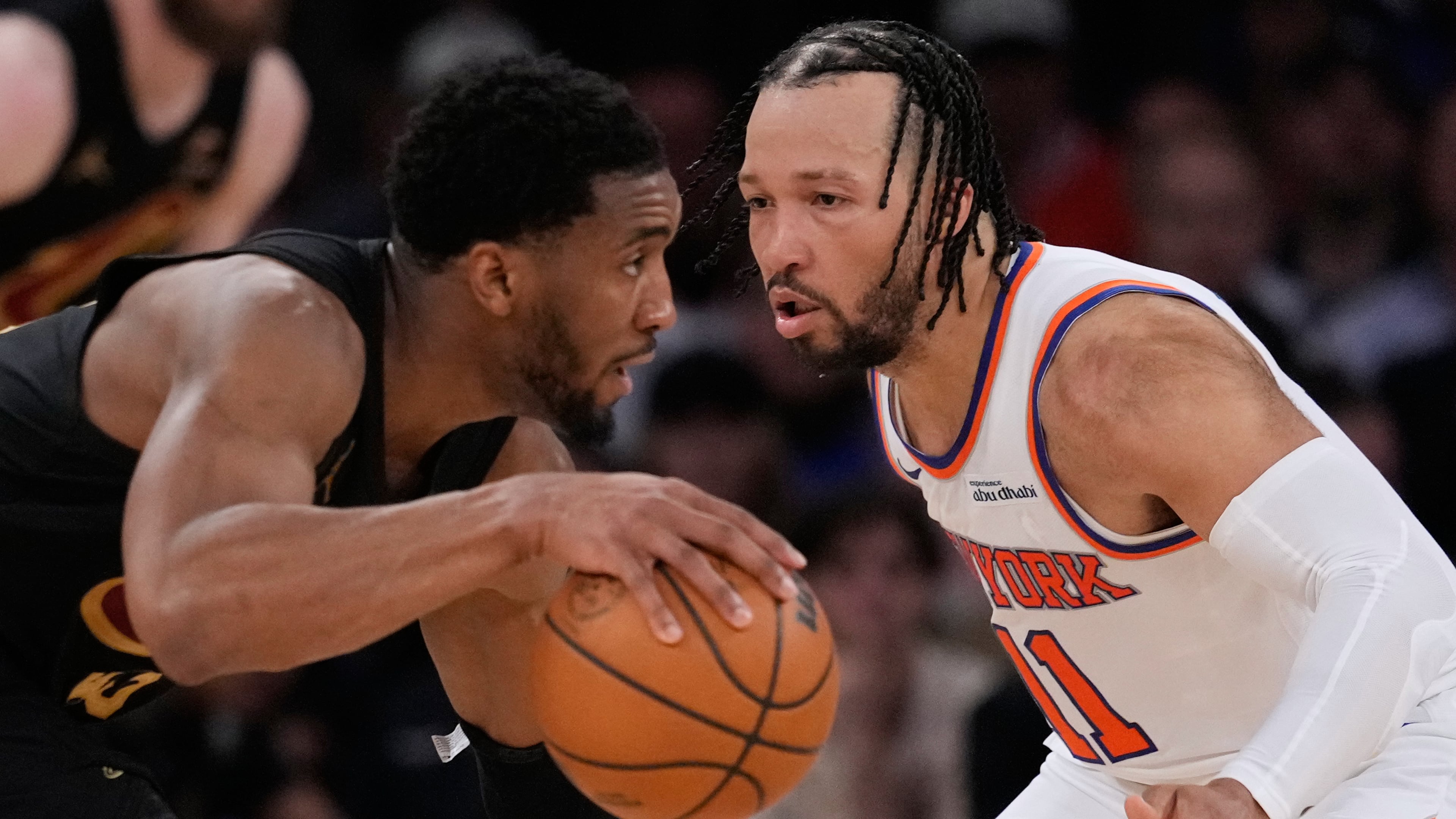 New York Knicks' Jalen Brunson, right, covers Cleveland Cavaliers' Donovan Mitchell, left, during the second half of Game 1 in the Eastern Conference finals NBA basketball playoffs series, Tuesday, May 19, 2026, in New York. (AP Photo/Seth Wenig)