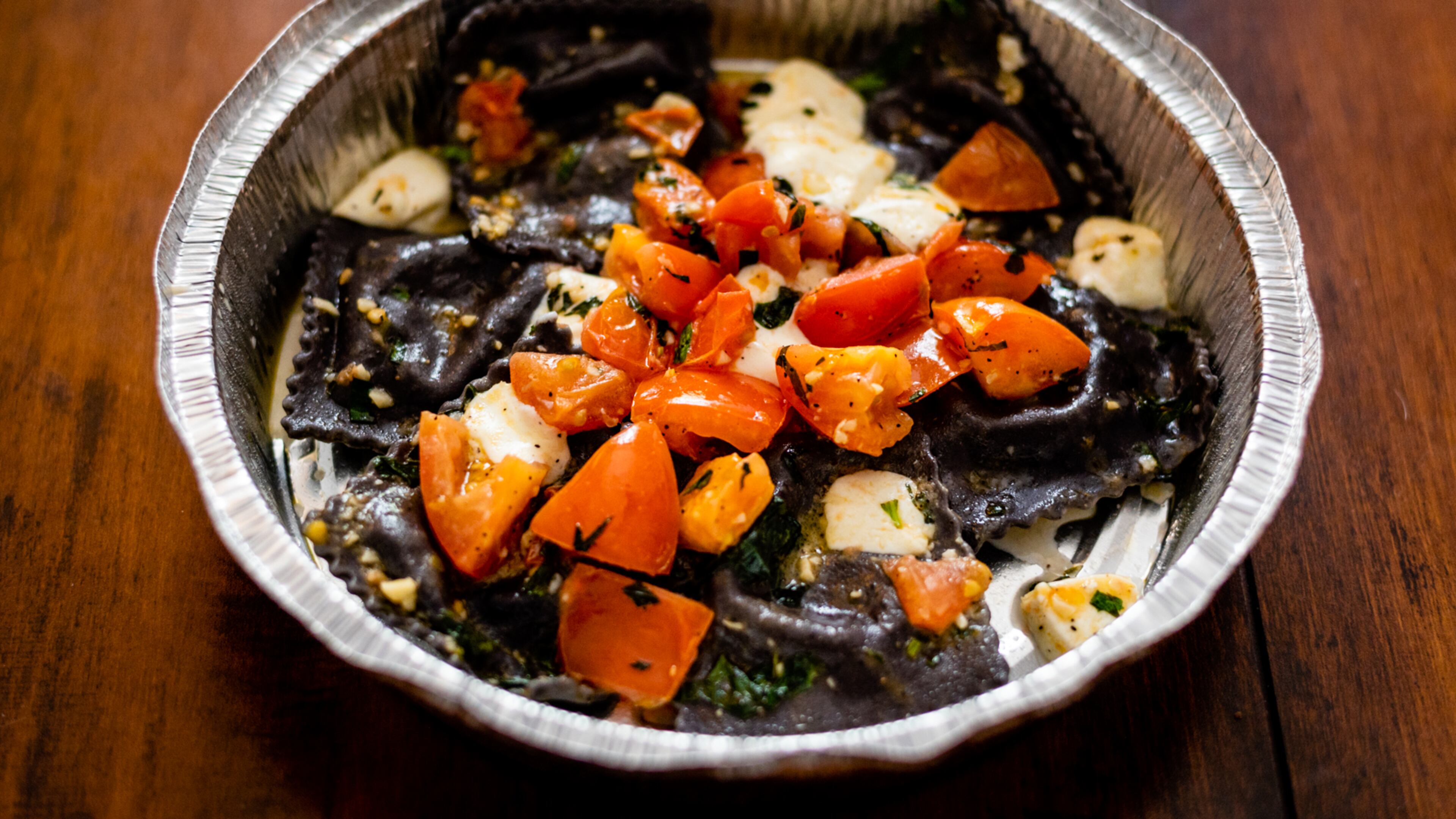 Figo offers wild mushroom ravioli with checca Fiorentina, a sauce of tomatoes, olive oil and mozzarella. Henri Hollis for The Atlanta Journal-Constitution