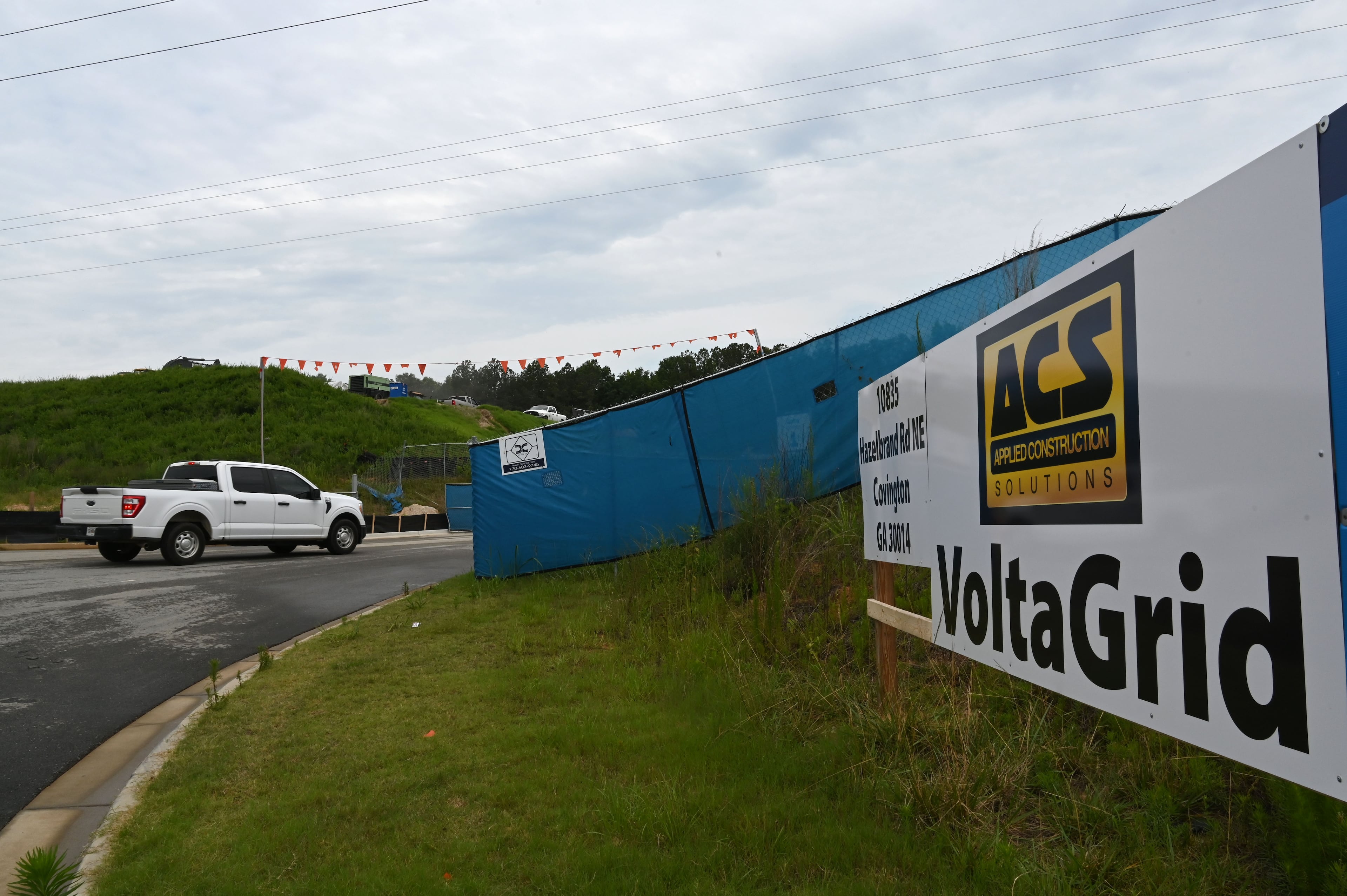 A sign is visible at a construction site where off-grid generators were being installed at a data center on Thursday, June 25, 2026, in Covington, Ga. (Hyosub Shin/AJC)