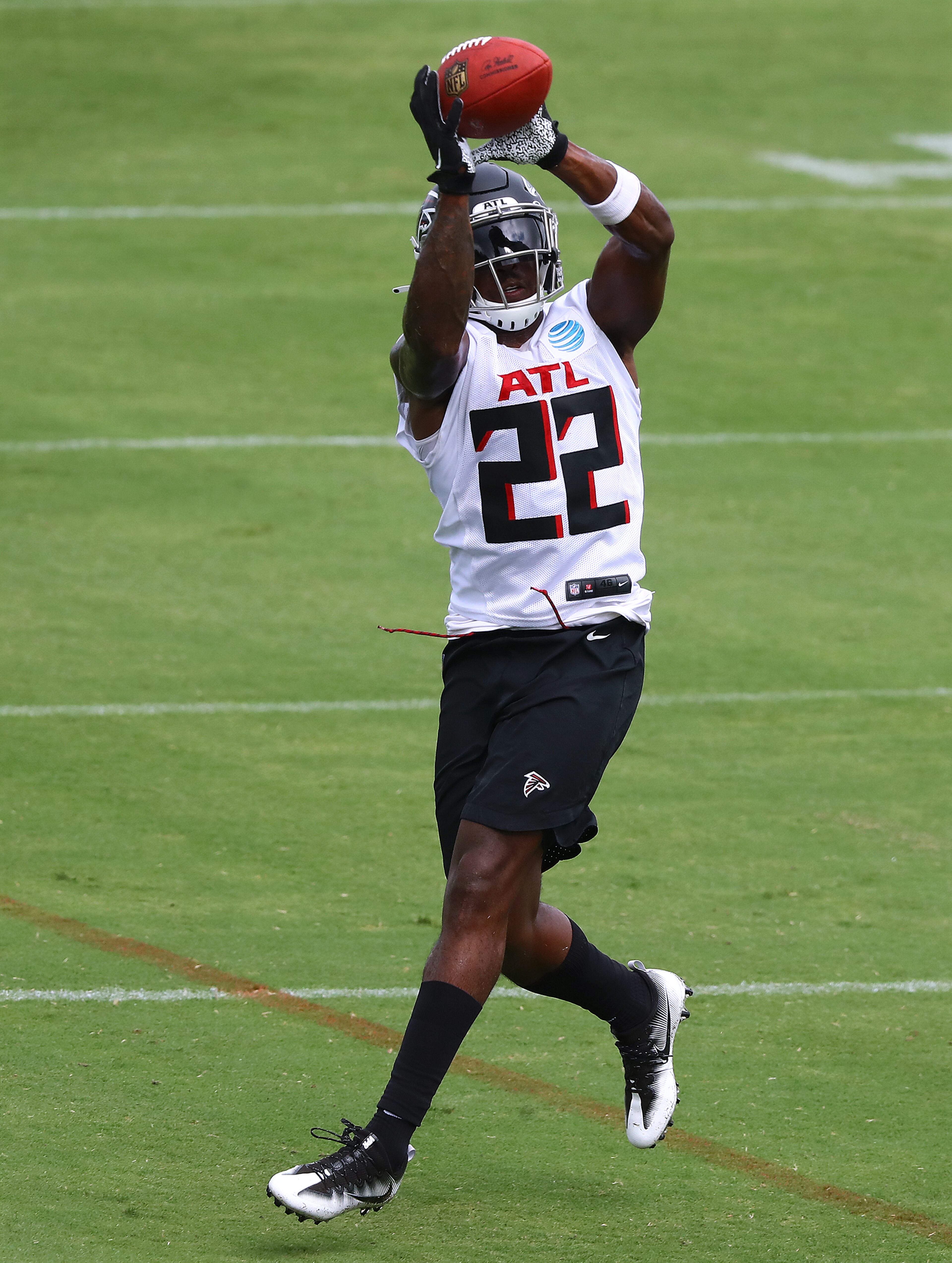 Falcons safety Keanu Neal intercepts a pass while running team drills during training camp on Saturday, August 15, 2020 in Flowery Branch. Curtis Compton ccompton@ajc.com