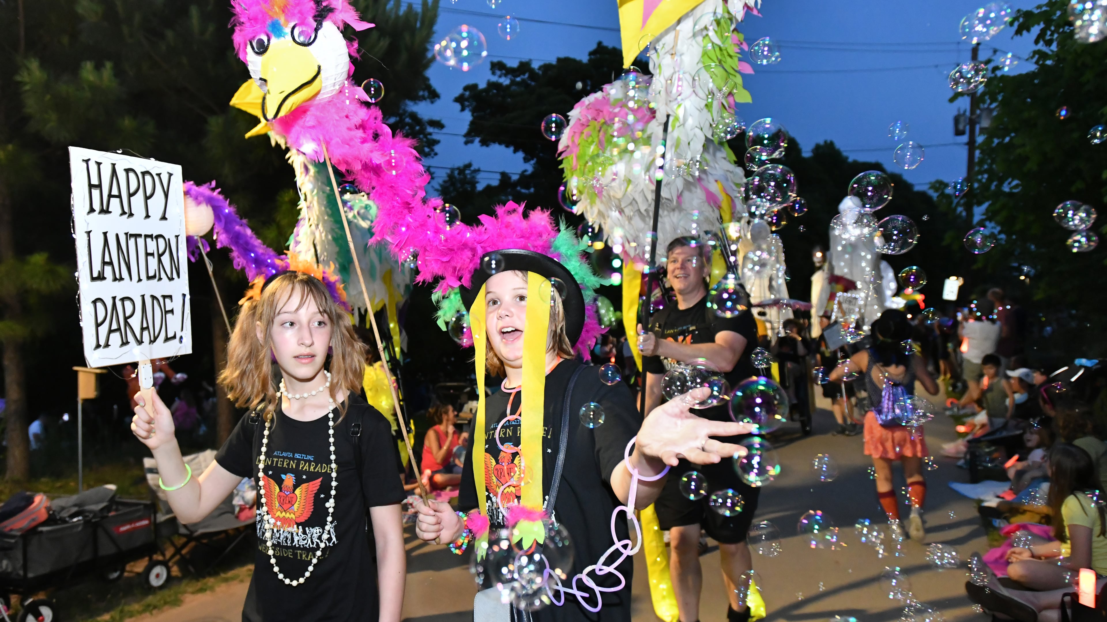 May 21, 2022 Atlanta - Thousands of participants and onlookers enjoy the 12th Atlanta Beltline Lantern Parade on the Atlanta Beltline Westside Trail on Saturday, May 21, 2022. In 2010, the Lantern Parade set out to encourage people to discover the unpaved Atlanta Beltline. Chantelle Rytter and the Krewe of the Grateful Gluttons submitted a performance proposal for the first year of Art on the Atlanta Beltline that called for people to make lanterns and join them for a nighttime stroll along the then-dirt Eastside Trail. The first parade garnered roughly 400 participants and no spectators. The Krewe ultimately succeeded in their mission – the parade grew to an estimated 70,000 participants and viewers in 2019.(Hyosub Shin / Hyosub.Shin@ajc.com)
