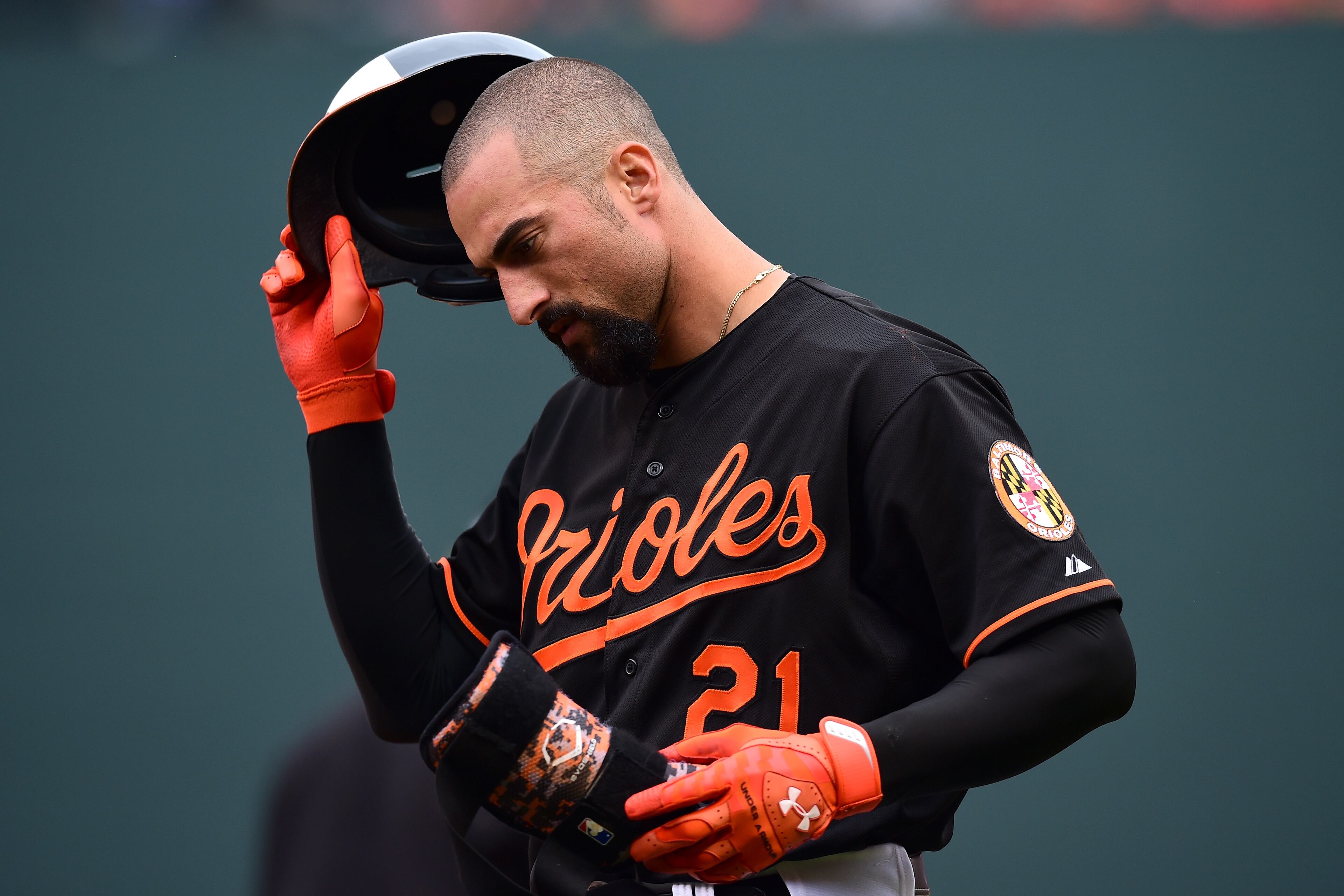 Nick Markakis #21 of the Baltimore Orioles reacts after grounding out in the seventh inning against the Detroit Tigers during Game Two of the American League Division Series at Oriole Park at Camden Yards on October 3, 2014 in Baltimore, Maryland. (Photo by Patrick Smith/Getty Images)