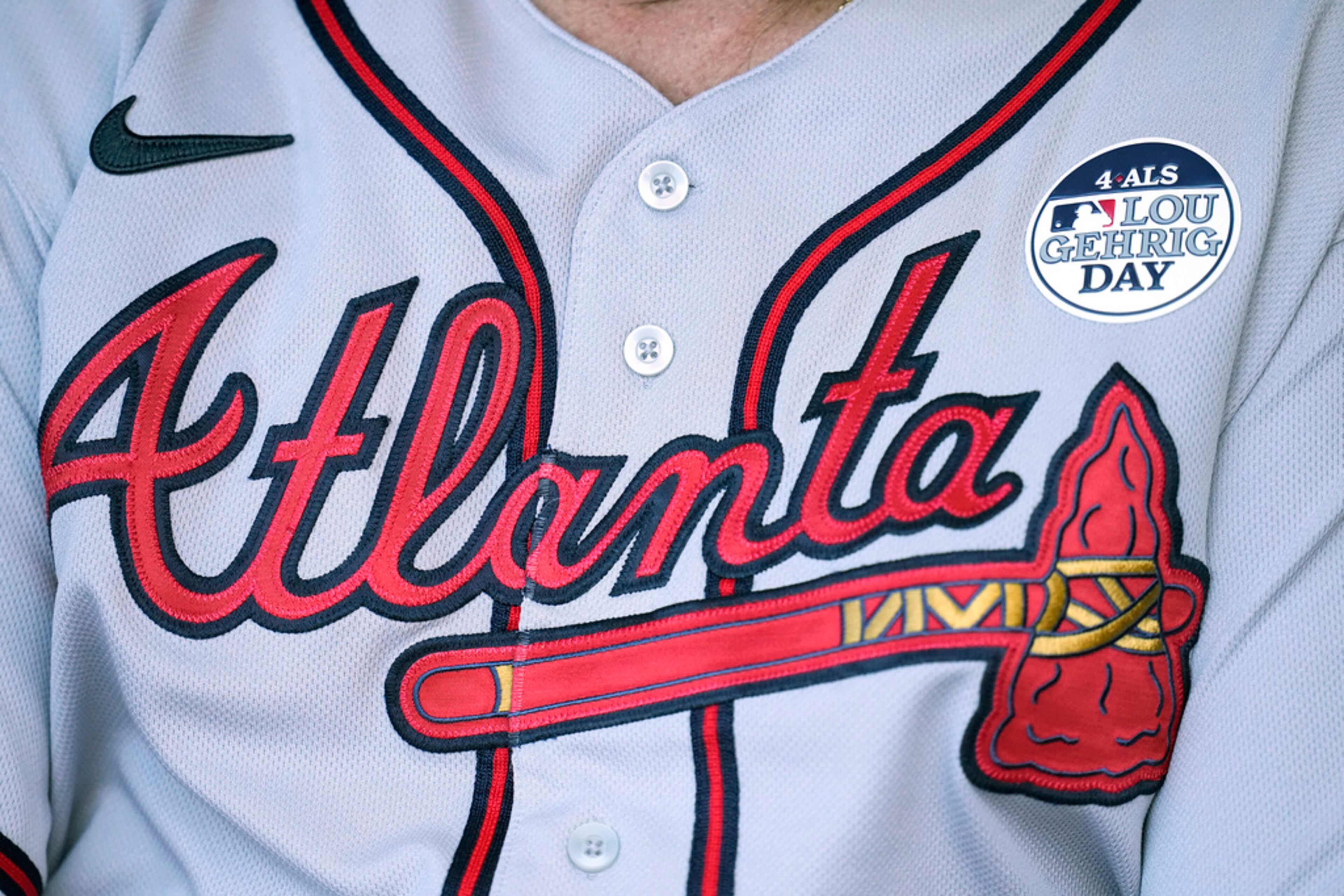 Atlanta Braves pitching coach Rick Kranitz sports a special MLB 4 ALS Lou Gehrig Day patch prior to a baseball game against the Arizona Diamondbacks, Friday, June 2, 2023, in Phoenix. (AP Photo/Ross D. Franklin)