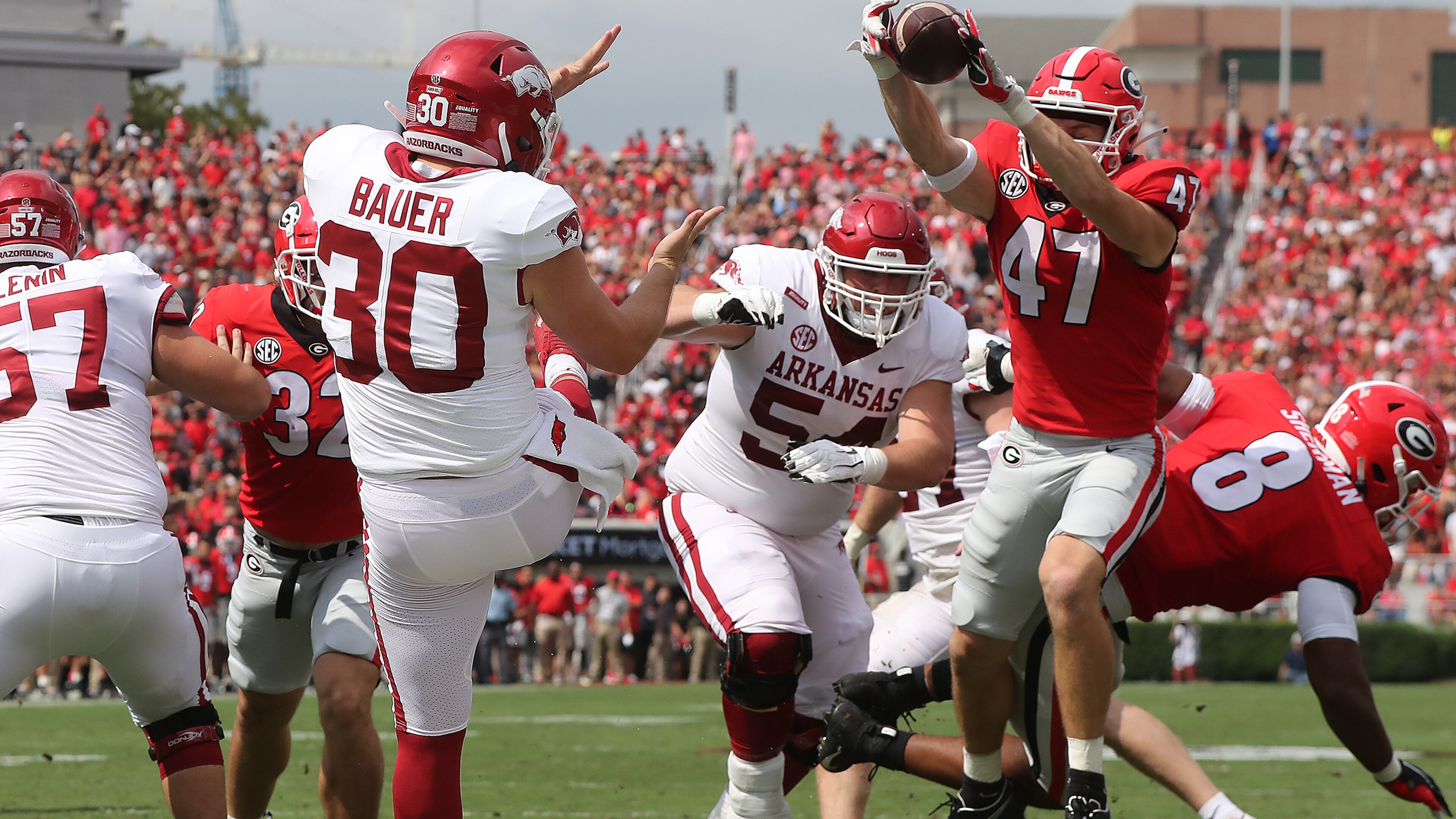 100221 ATHENS: Georgia defensive back Dan Jackson blocks the punt in the endzone by Arkansas kicker Reid Bauer and Georgia recovered for the touchdown to take a 21-0 lead during the first quarter in a NCAA college football game on Saturday, Oct. 2, 2021, in Athens. “Curtis Compton / Curtis.Compton@ajc.com”