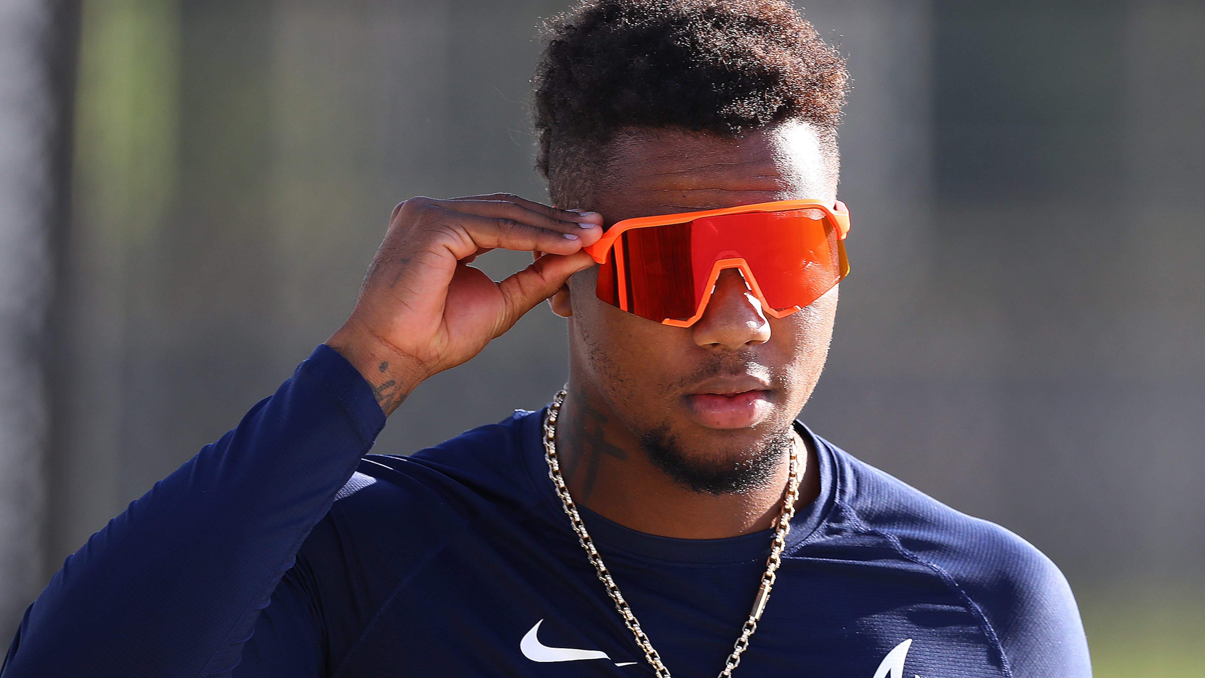 031822 North Port: Atlanta Braves Ronald Acuna puts on his sunglasses while getting in some early morning batting practice during Spring Training on Friday, March 18, 2022, before playing the Minnesota Twins in a MLB preseason game in North Port. “Curtis Compton / Curtis.Compton@ajc.com”